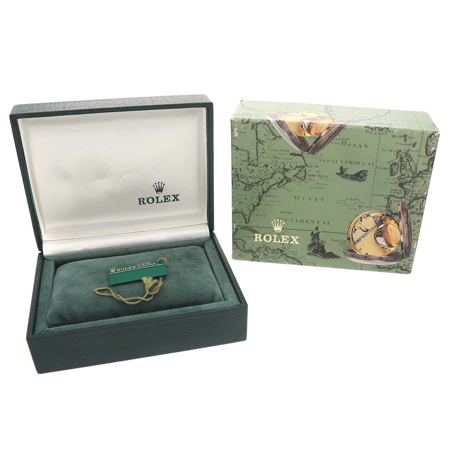 The image shows a green Rolex box open to reveal an empty cushion and a tag, alongside a decorated outer box.