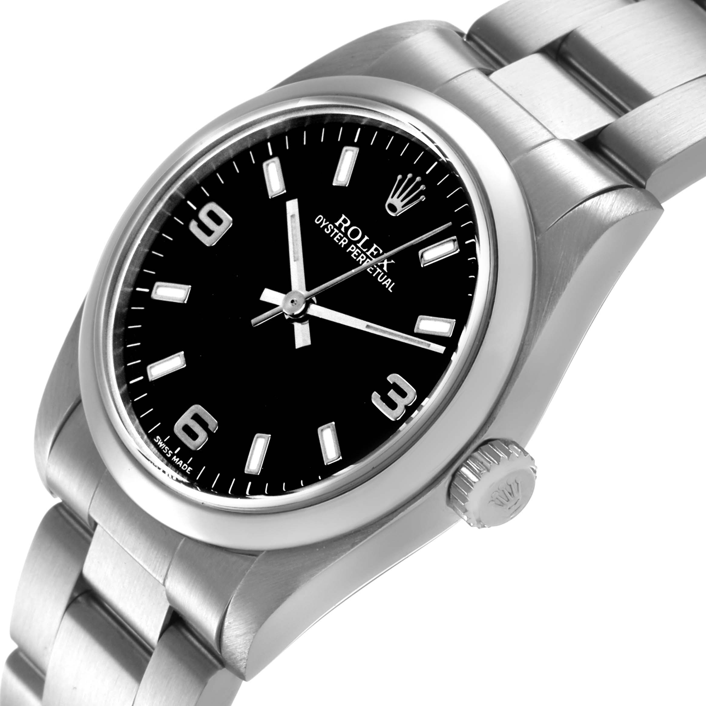 The Rolex Mid-Size 77080 Womens Stainless Steel Black Dial watch is shown from an angle highlighting the black dial, crown, and part of the bracelet.