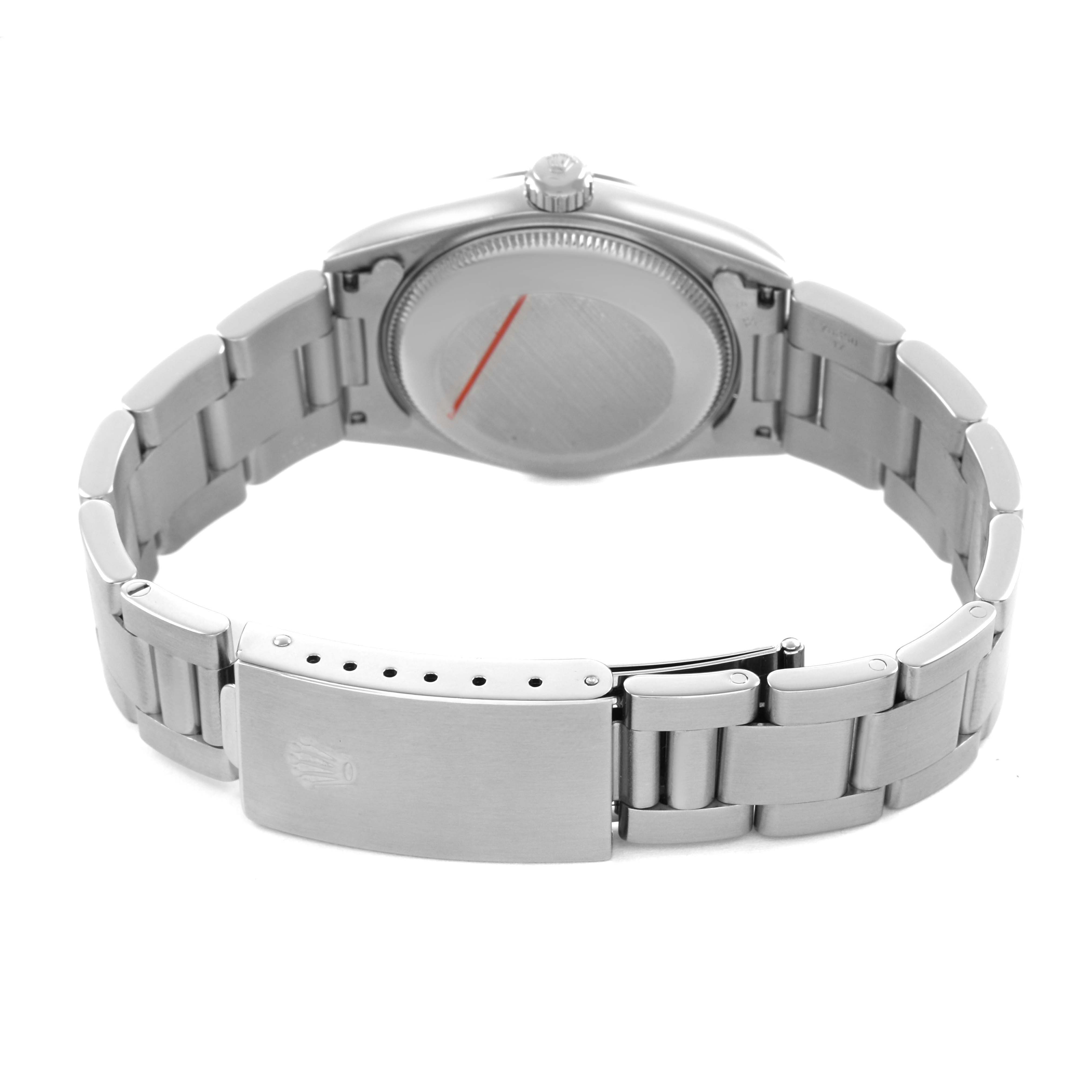 The image shows the back view of a Rolex Mid-Size 77080 Womens Stainless Steel Black Dial watch, highlighting the case back and metal bracelet with the clasp.