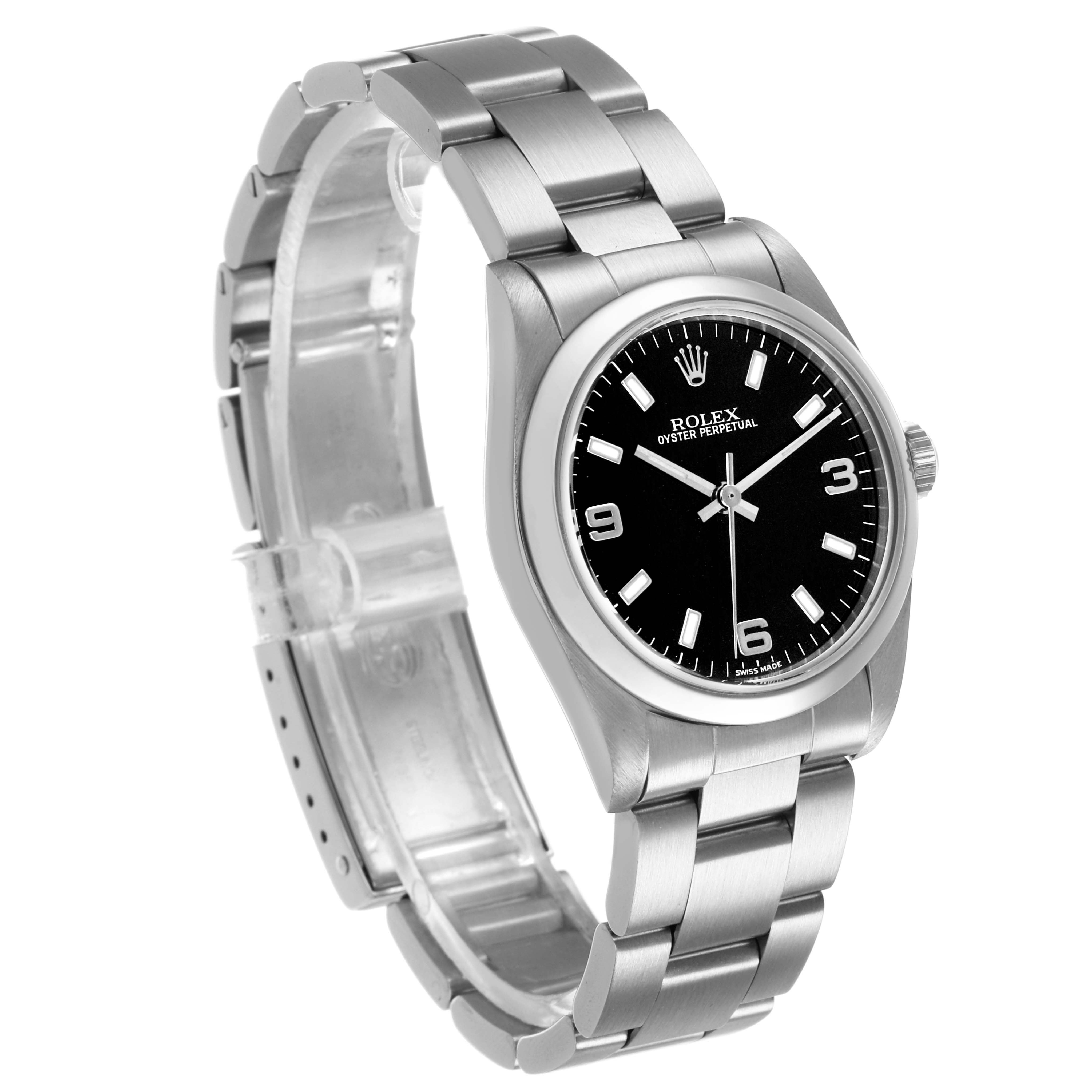 The Rolex Mid-Size 77080 Womens Stainless Steel Black Dial watch is displayed at a three-quarter angle, showing the face, bezel, bracelet, and crown.