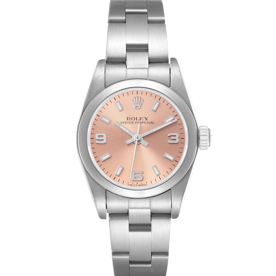 The Rolex Oyster Perpetual watch is shown from a front view, displaying its pink dial, silver hands, and metal bracelet.
