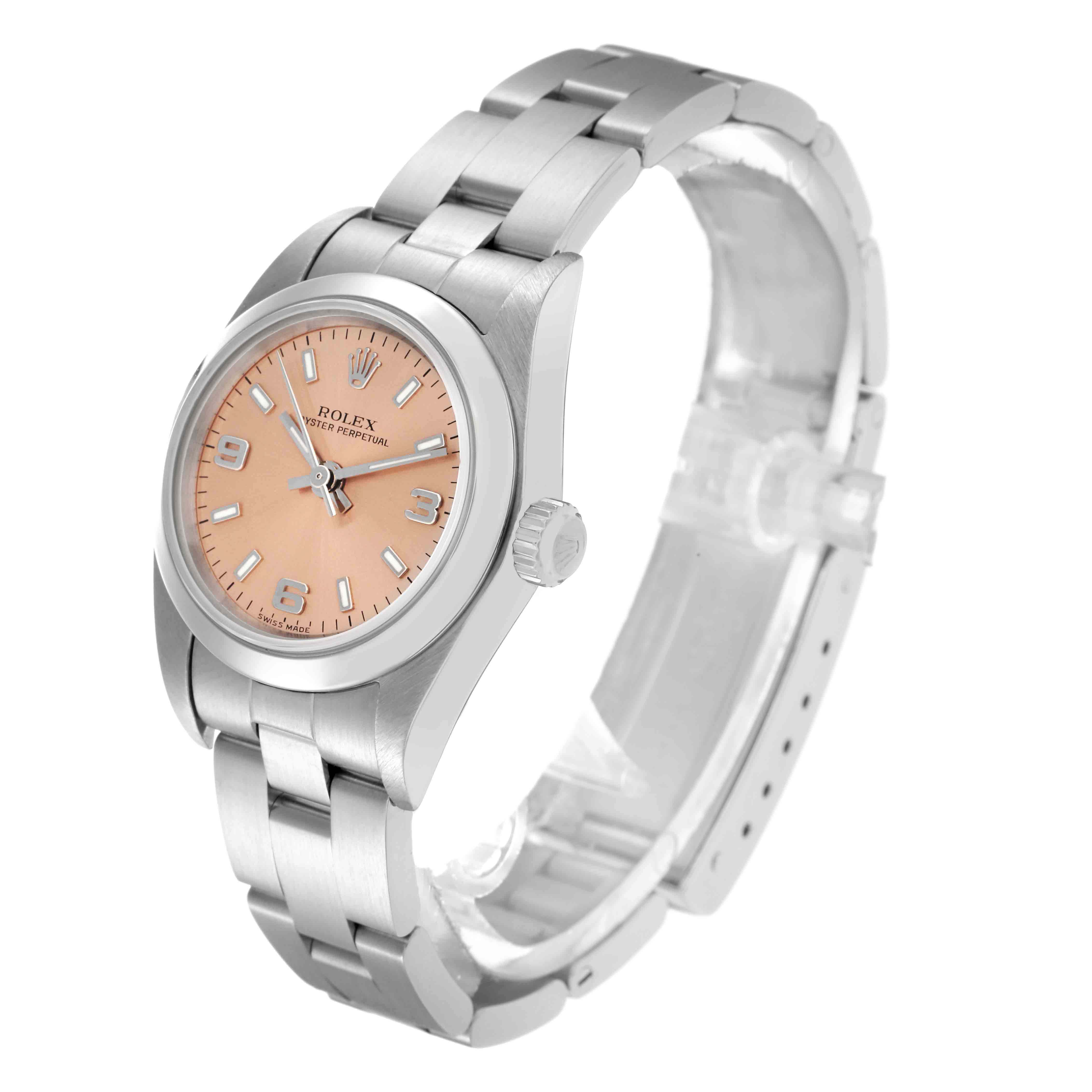 The Rolex Oyster Perpetual 76080 Women
s Stainless Steel Pink Dial 76080 Women
s Stainless Steel Pink Dial watch is shown at an angle highlighting the dial, case, crown, and bracelet.