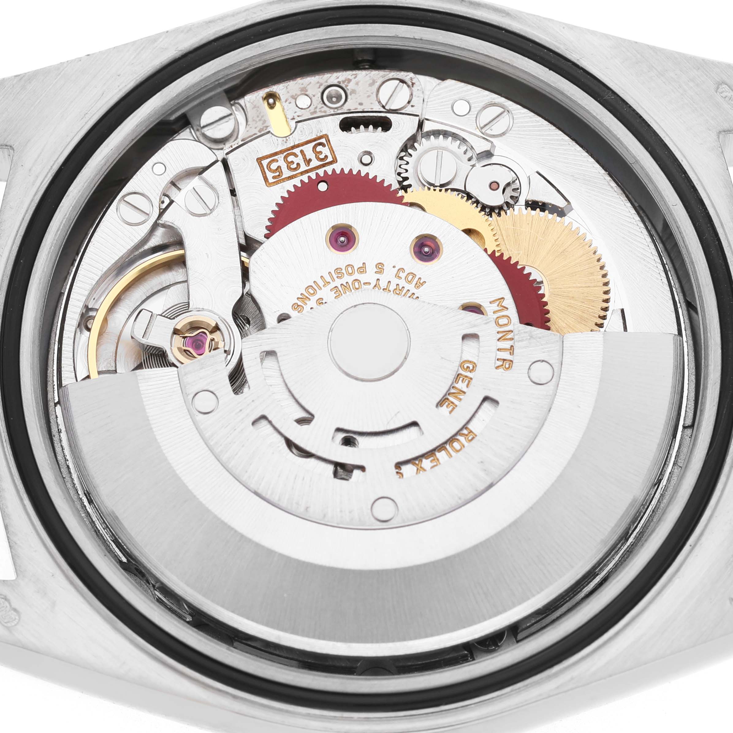 The image shows the movement of a Rolex President 18239BIC Men's White Gold Champagne Dial model from the back, revealing gears and the rotor.