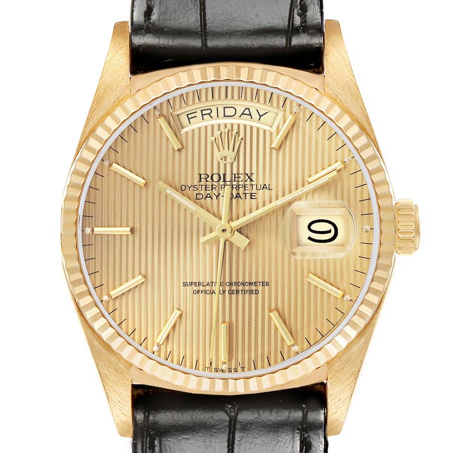 The Rolex President model watch is shown from the front, displaying the dial, fluted bezel, and leather strap.