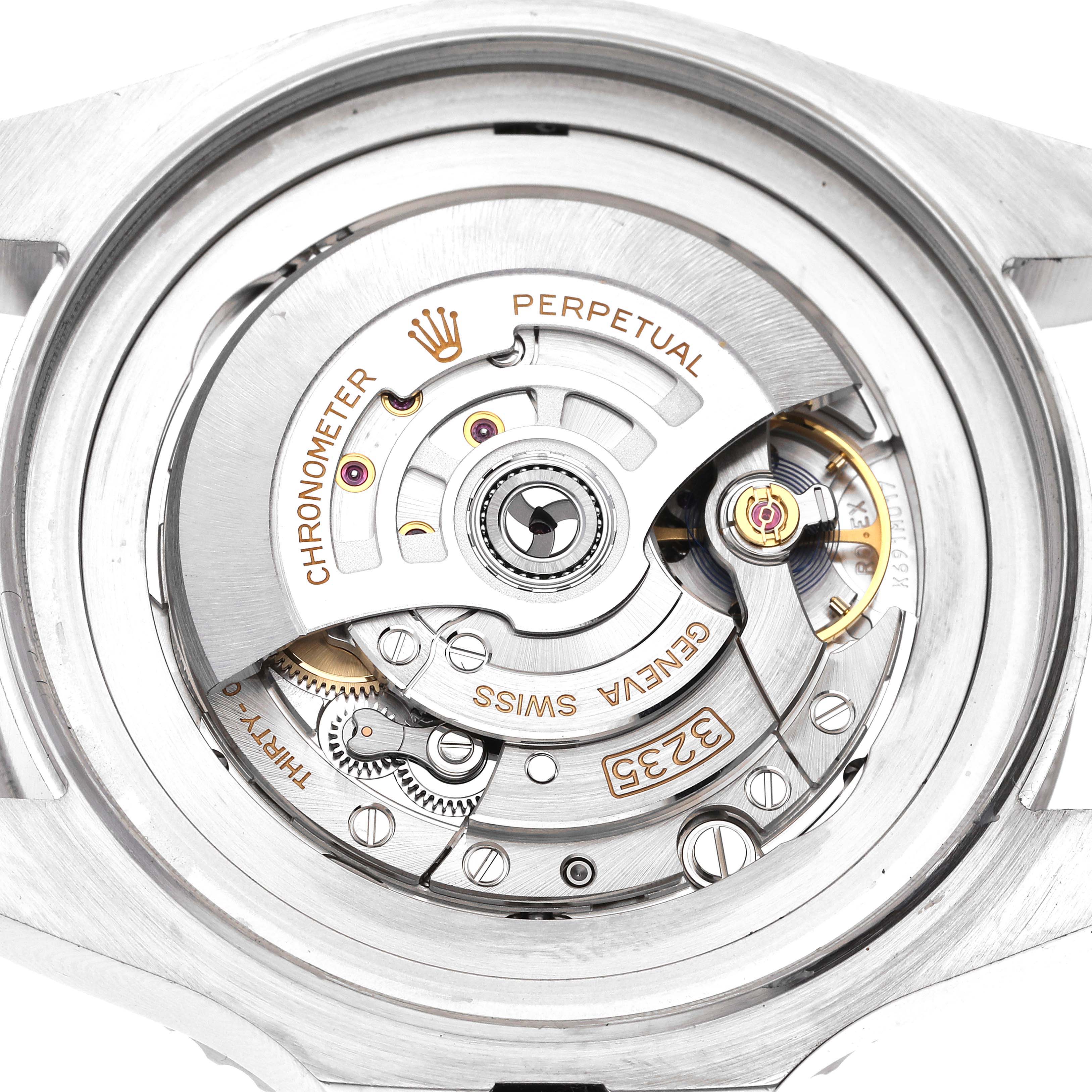 The image shows a close-up view of the movement mechanism of a Rolex Sea-Dweller 136660 Men
s Stainless Steel Blue Dial 136660 Men
s Stainless Steel Blue Dial watch, model 3235.