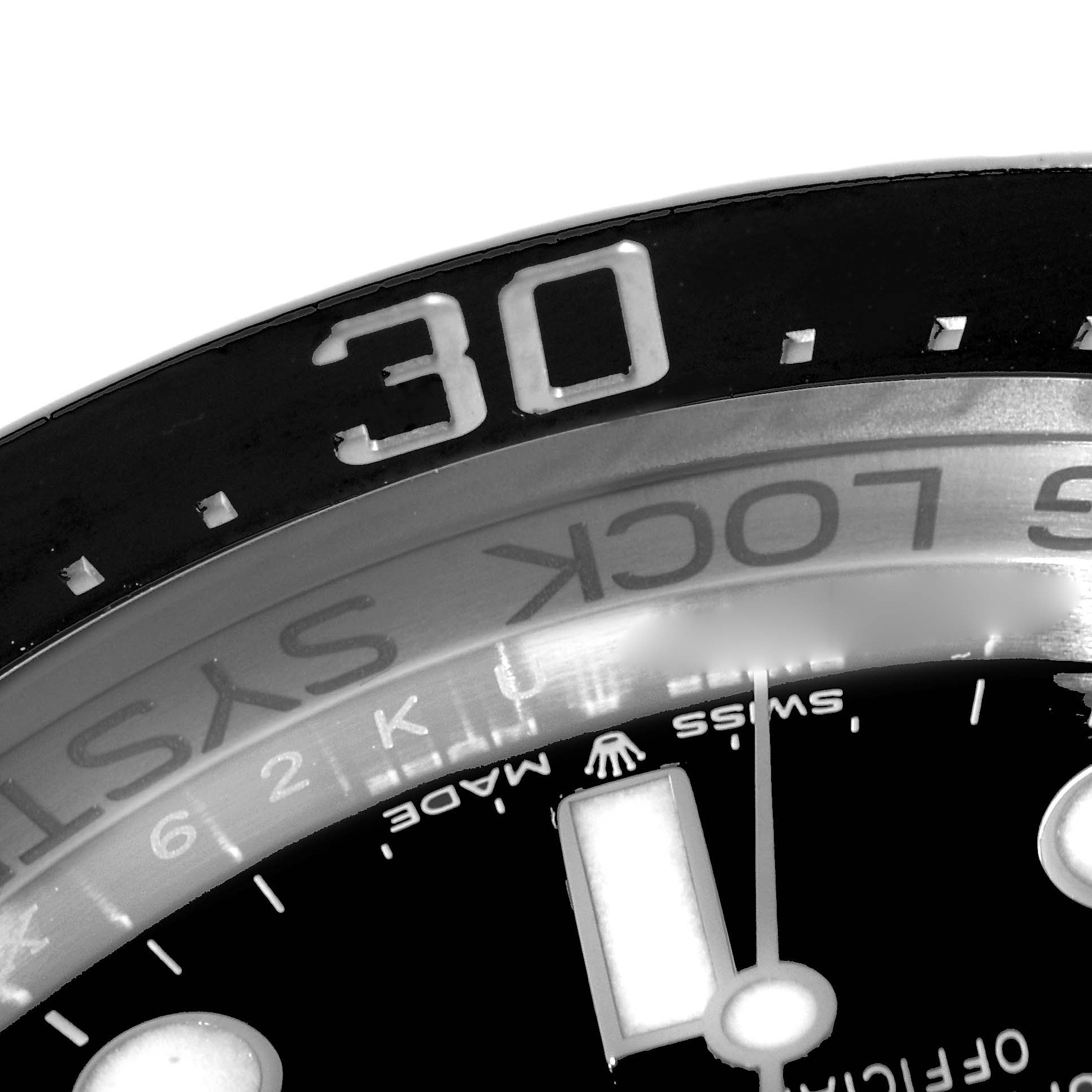 The image shows a close-up of the bezel and part of the dial of a Rolex Sea-Dweller 136660 Men
s Stainless Steel Blue Dial 136660 Men
s Stainless Steel Blue Dial watch.