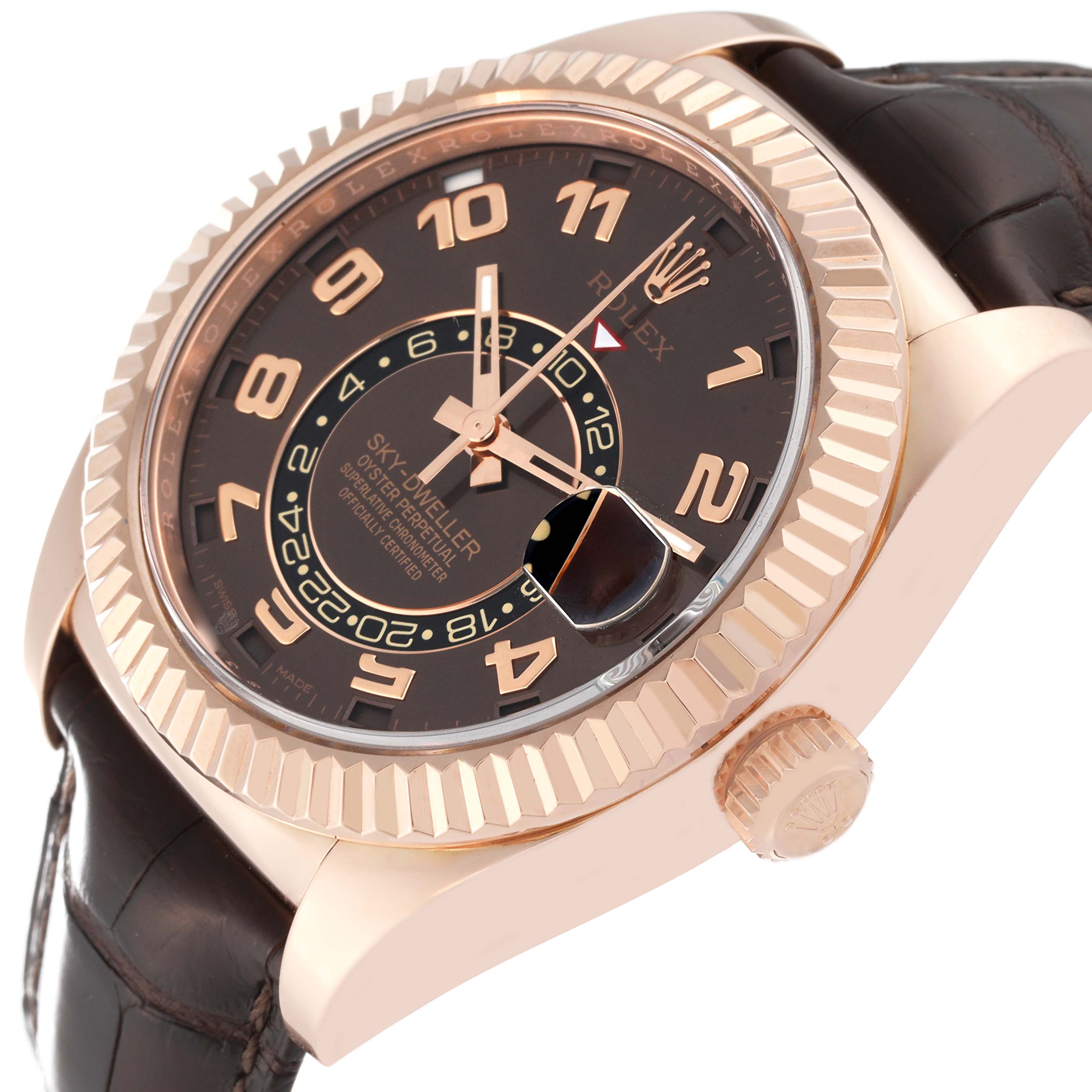 This Rolex Sky-Dweller 326135 Men's Rose Gold Brown Dial 326135 Men's Rose Gold Brown Dial watch is shown at an angled view highlighting the dial, case, bezel, and part of the strap.