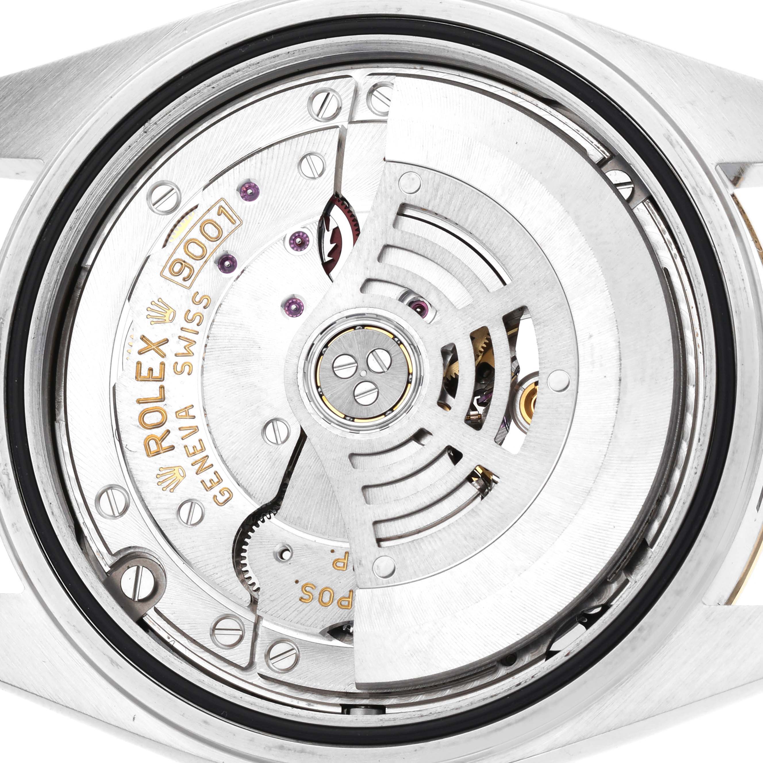The image shows the back view of a Rolex Sky-Dweller 326933 Men
s Steel and Gold (two tone) Silver Dial 326933 Men
s Steel and Gold (two tone) Silver Dial watch, highlighting the movement and rotor mechanism.