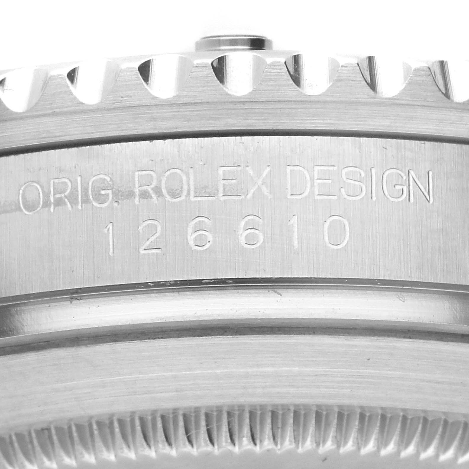 This image shows a close-up of the side of a Rolex Submariner 126610 Men
s Stainless Steel Black Dial 126610 Men
s Stainless Steel Black Dial watch model 126610, highlighting the engraved text "ORIG. ROLEX DESIGN."