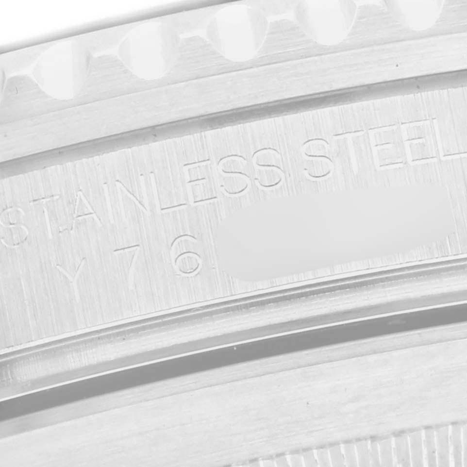 The image shows a close-up view of the side of a Rolex Submariner 16610 Men
s Stainless Steel Black Dial 16610 Men
s Stainless Steel Black Dial, highlighting the stainless steel engraving.