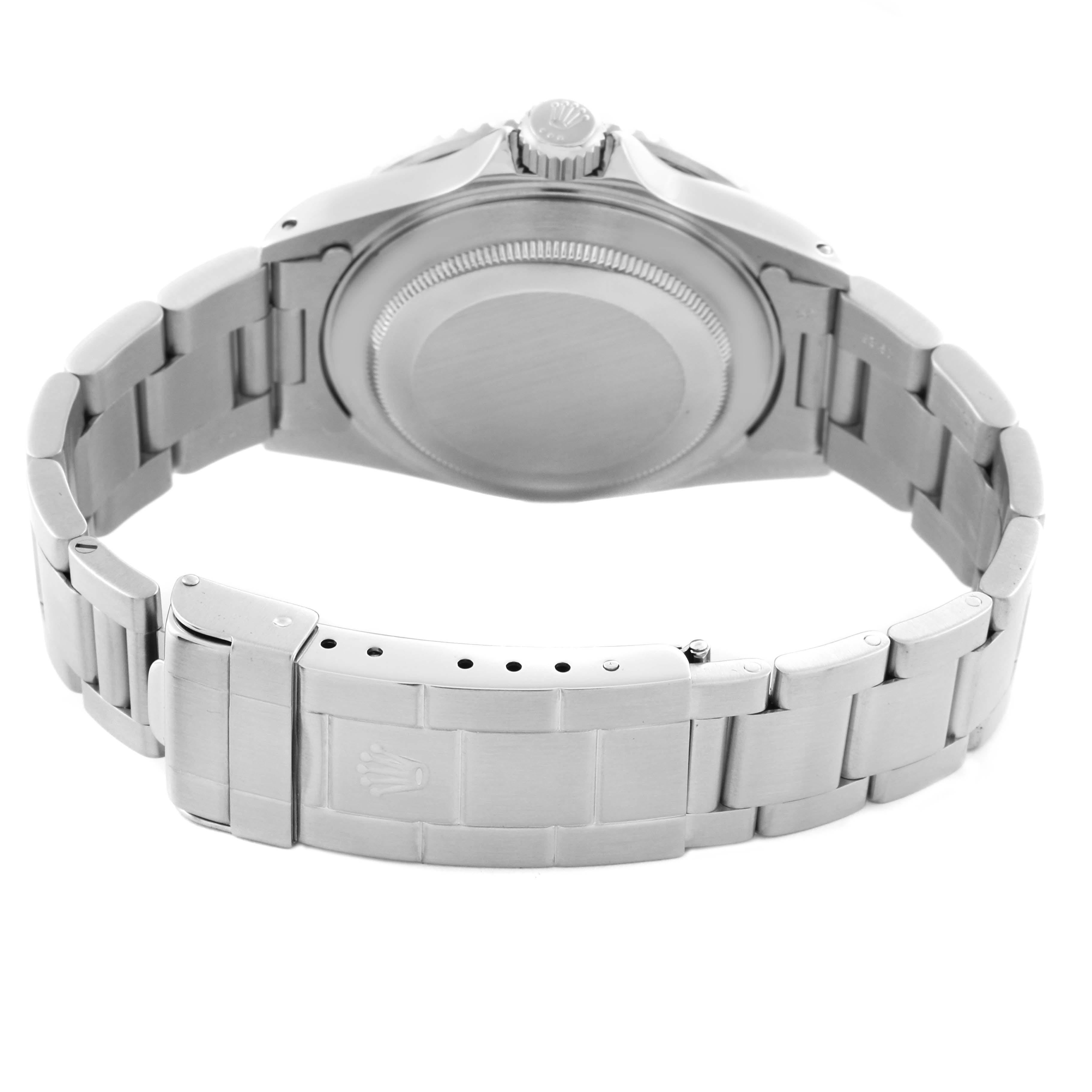 The image shows the back view of a Rolex Submariner 16610 Men
s Stainless Steel Black Dial 16610 Men
s Stainless Steel Black Dial, focusing on the bracelet and clasp.