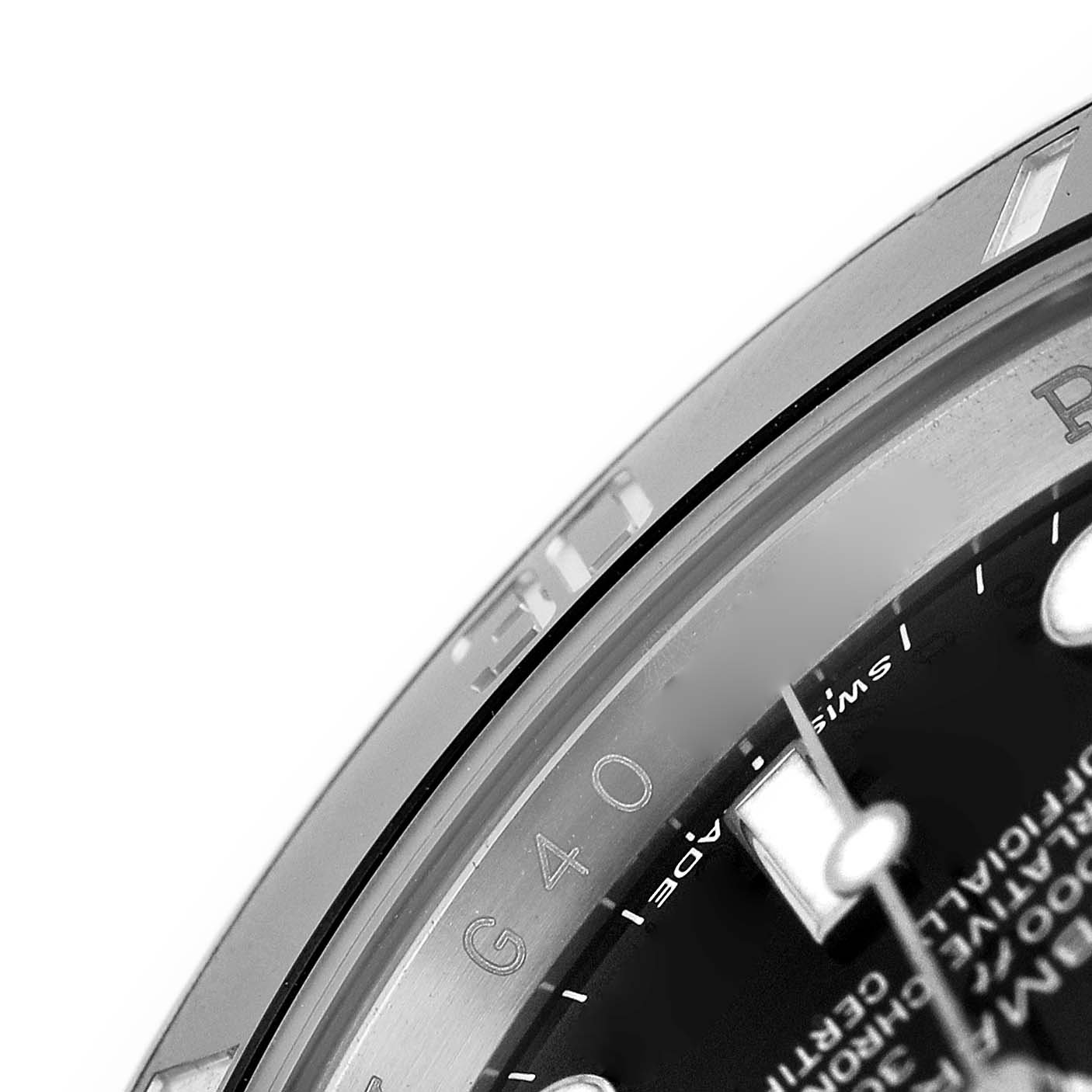 The image shows a close-up angle of a Rolex Submariner 116610 Mens Stainless Steel Black Dials dial and bezel, highlighting the edge detail and a portion of the text.