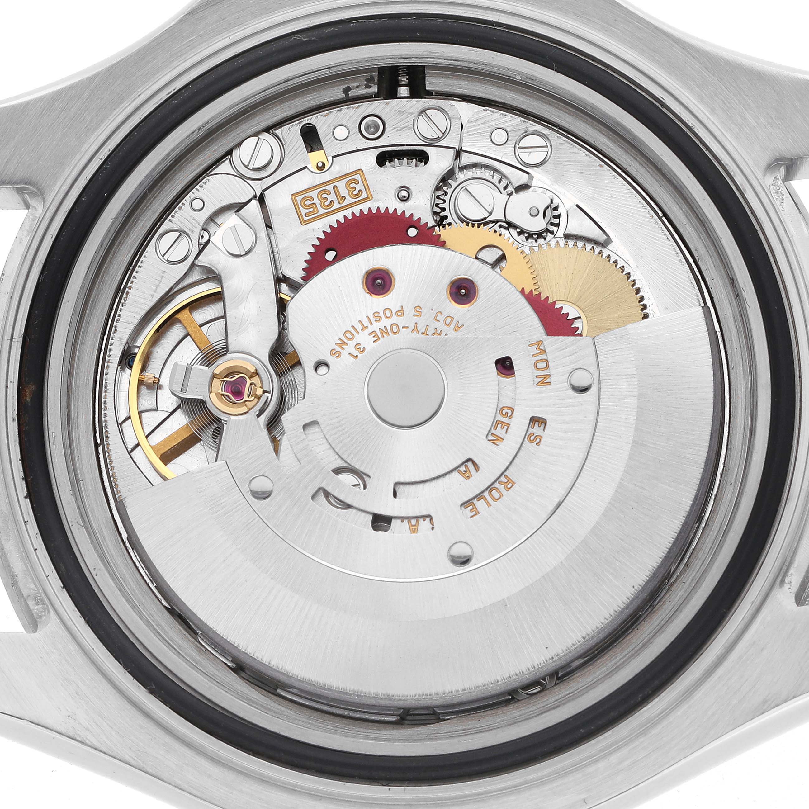 This image shows the movement of a Rolex Yacht-Master 16622 Men
s Stainless Steel Silver Dial 16622 Men
s Stainless Steel Silver Dial watch from the back, highlighting gears and intricate mechanical parts.