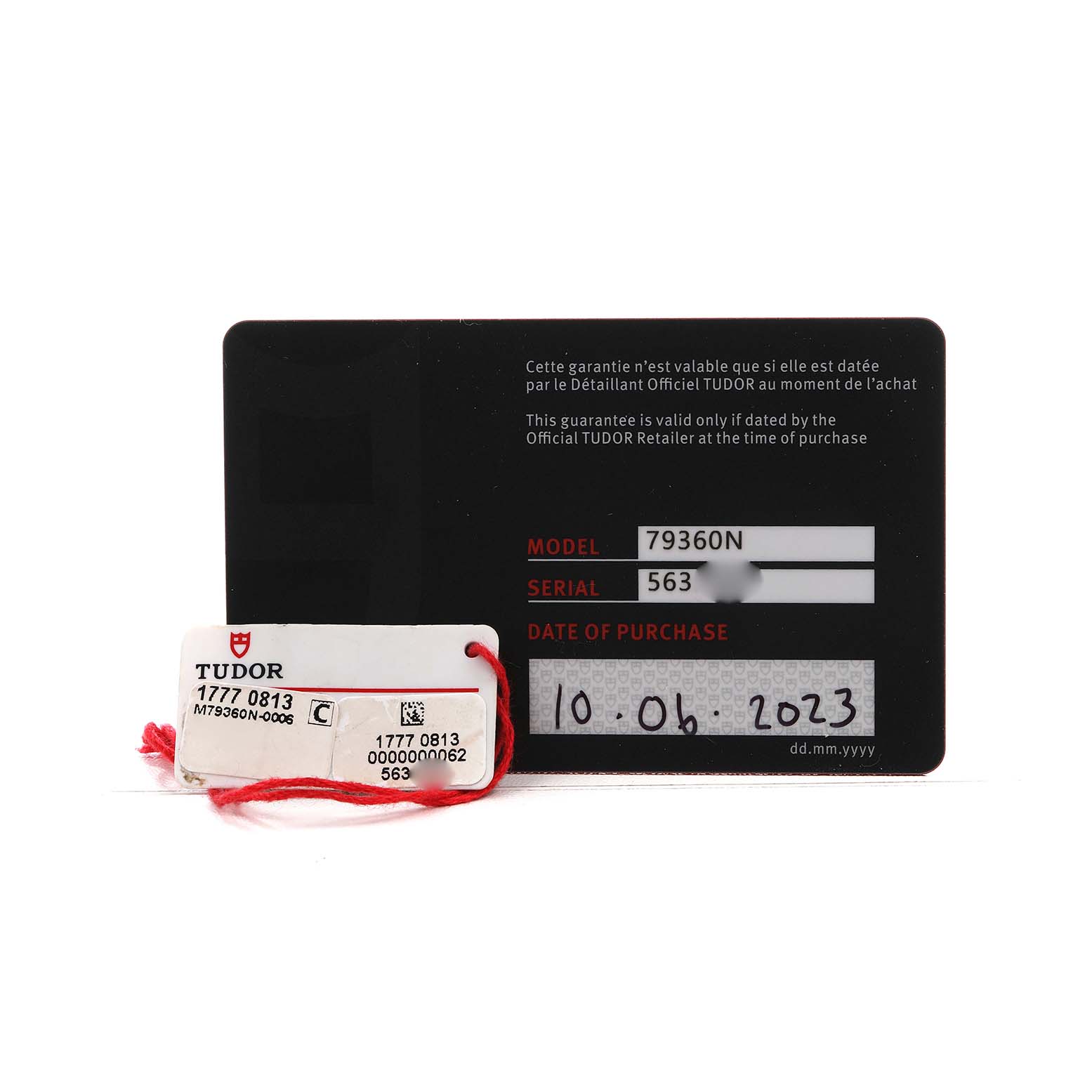 The image shows the warranty card and tag for the Tudor Heritage Black Bay 79360 Men's Stainless Steel Silver Dial model.