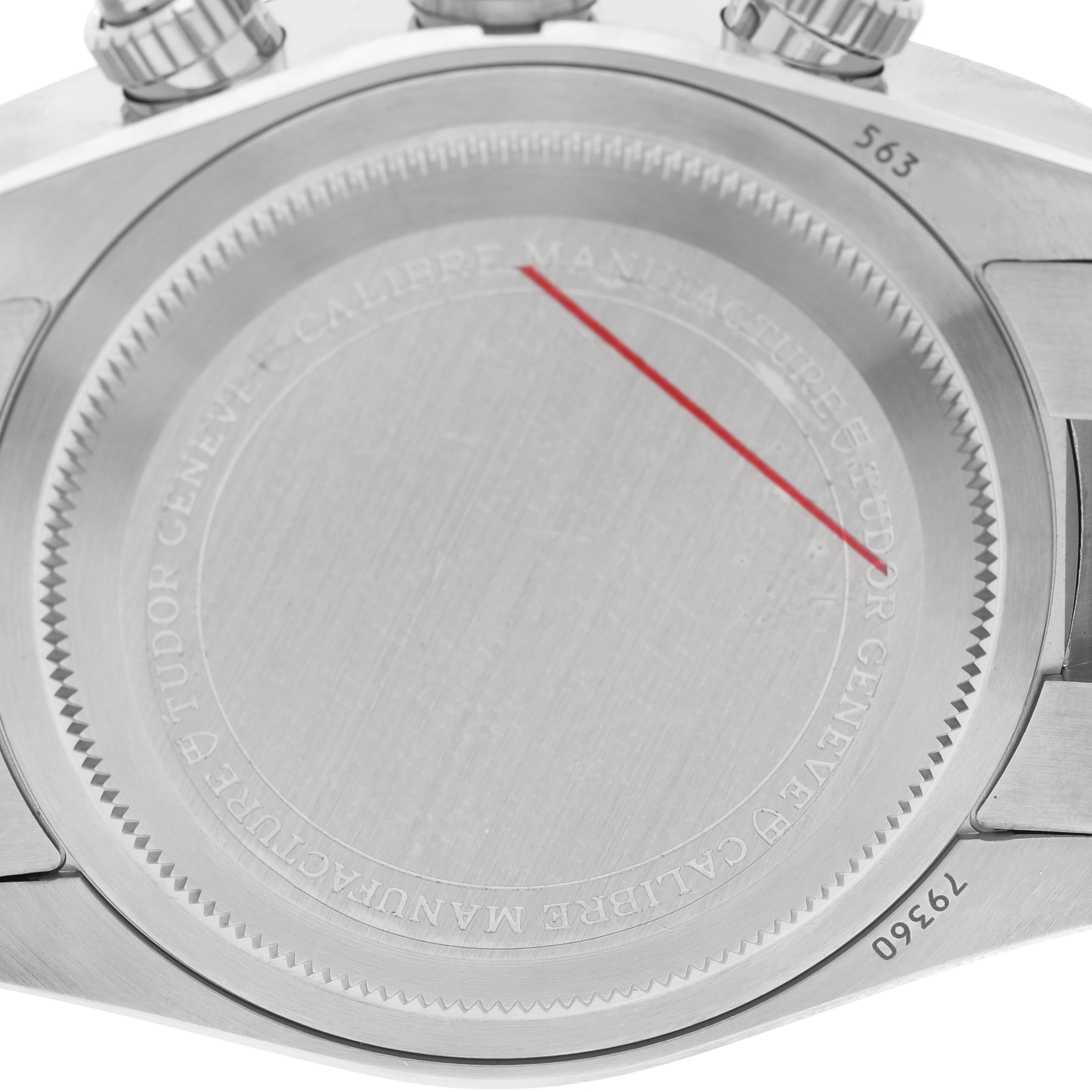 The image shows the back case of the Tudor Heritage Black Bay 79360 Men's Stainless Steel Silver Dial watch, highlighting engravings and a red line detail.