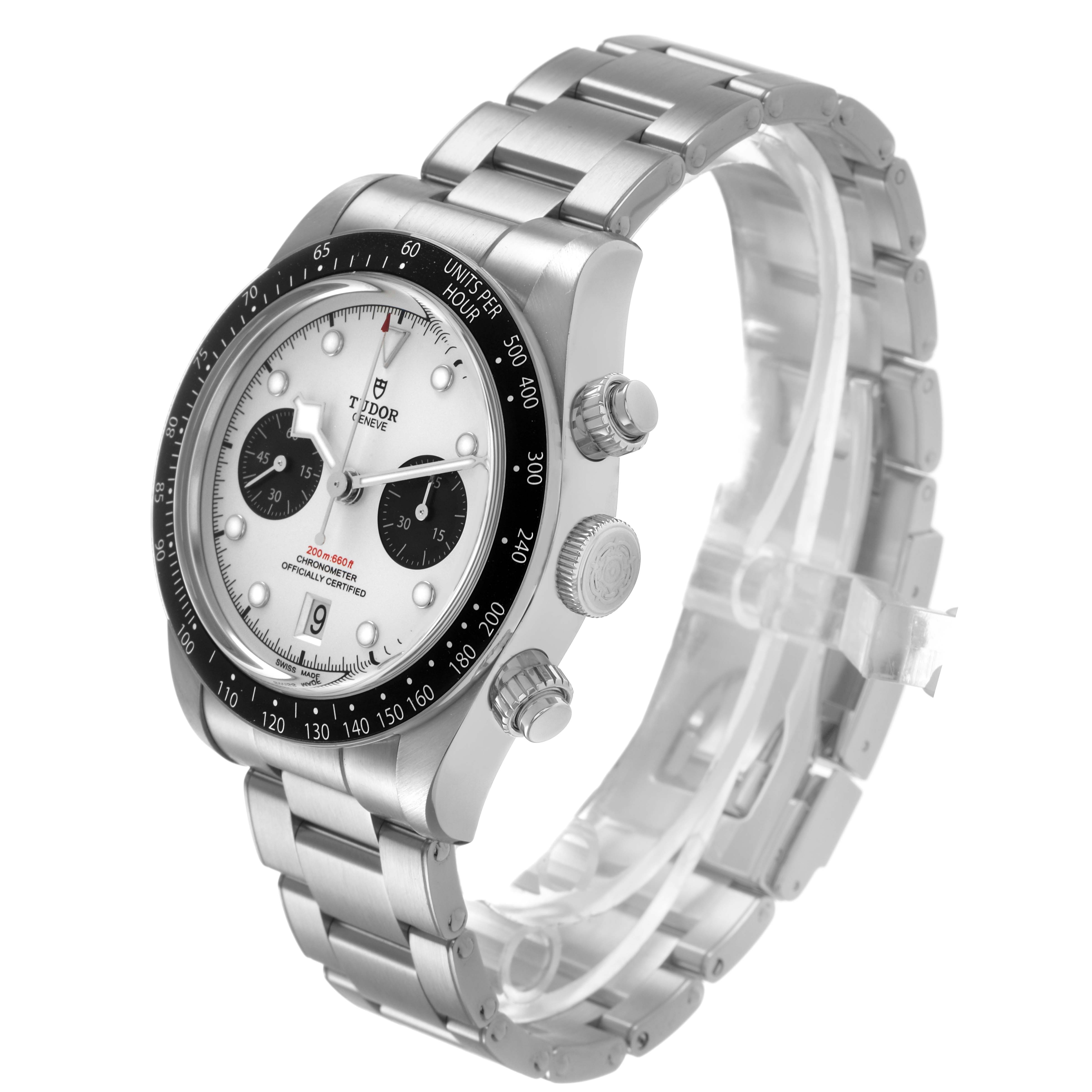 The Tudor Heritage Black Bay 79360 Men's Stainless Steel Silver Dial watch is shown at a three-quarter angle, displaying the face, bracelet, and side pushers.