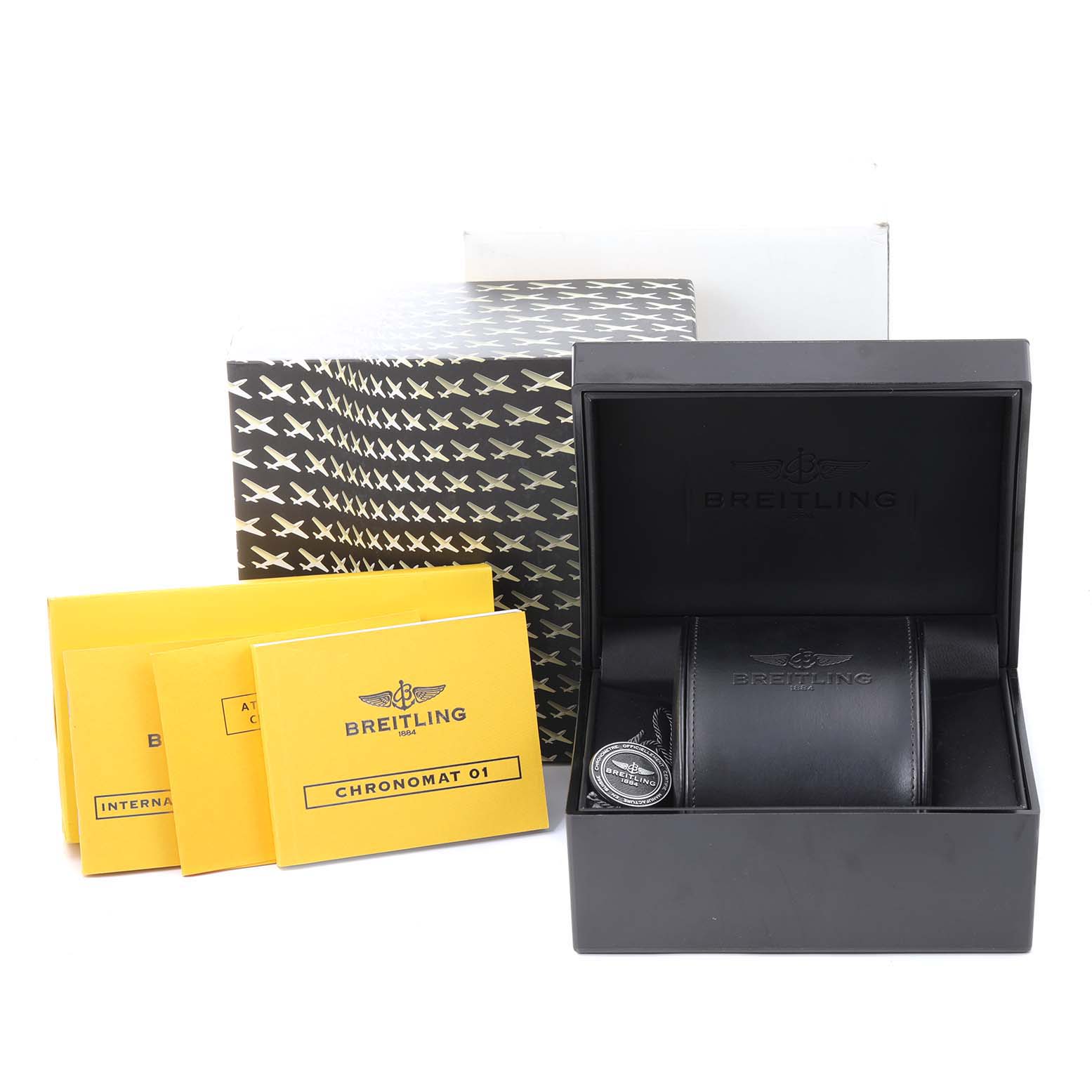 The image shows the Breitling Chronomat AB0110 Men
s Stainless Steel Black Dial AB0110 Men
s Stainless Steel Black Dial watch packaging, including the watch box, manuals, and certificates.