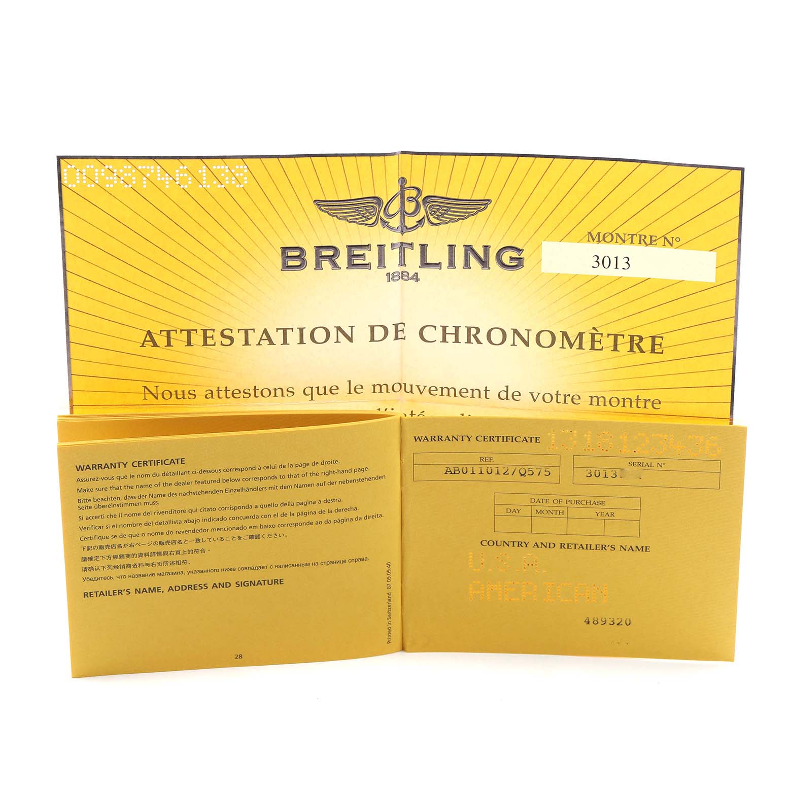 The image shows Breitling Chronomat AB011012/Q575 Men
s Stainless Steel Brown Dial AB011012/Q575 Men
s Stainless Steel Brown Dial warranty and certification papers laid flat.