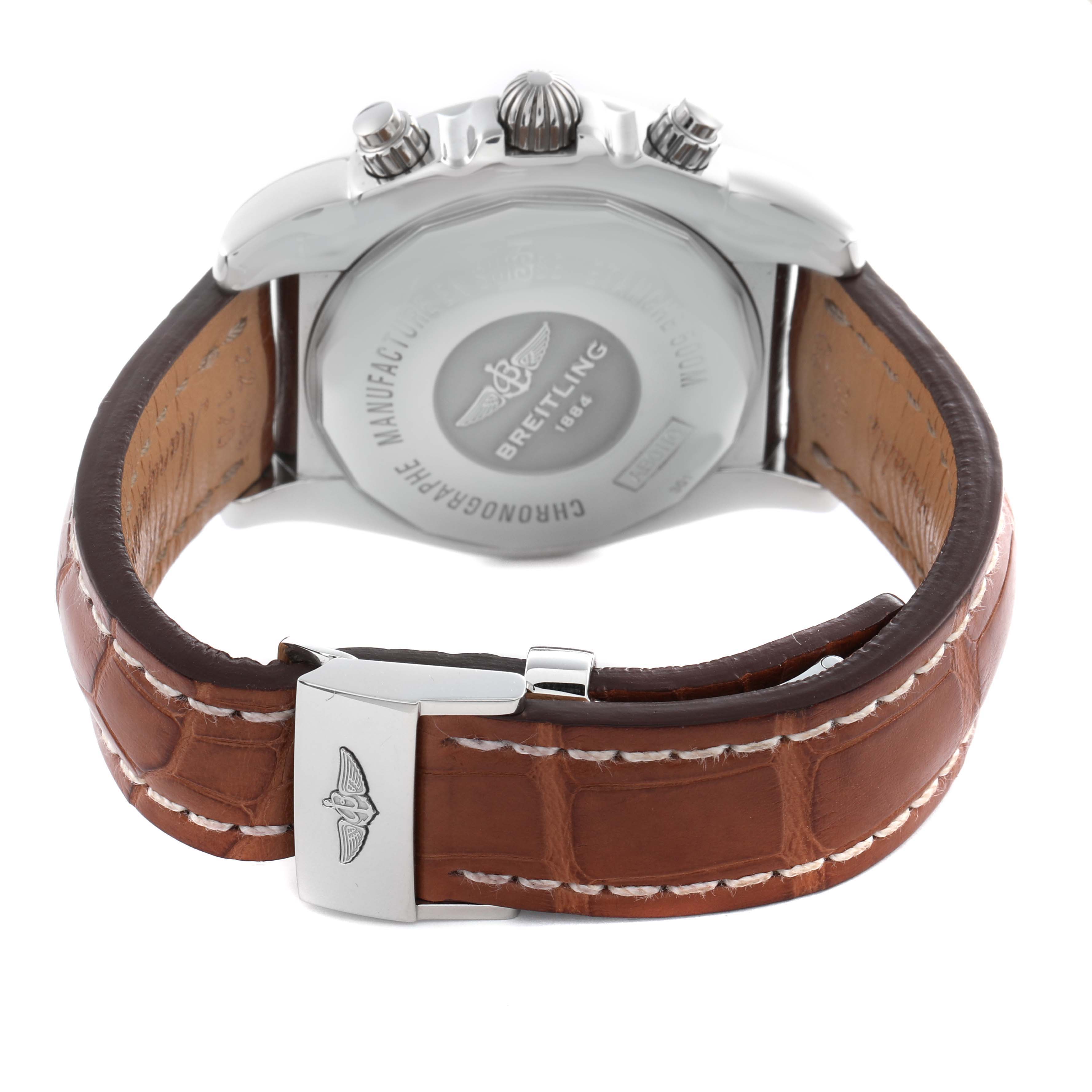 The image shows the back case, crown, and clasp of a Breitling Chronomat AB011012/Q575 Men
s Stainless Steel Brown Dial AB011012/Q575 Men
s Stainless Steel Brown Dial watch, highlighting its leather strap and engraved details.