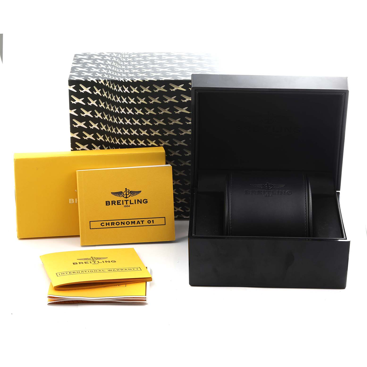 The image shows the Breitling Chronomat AB011012/Q575 Men
s Stainless Steel Brown Dial AB011012/Q575 Men
s Stainless Steel Brown Dial watch box and accompanying documents, viewed from the front.