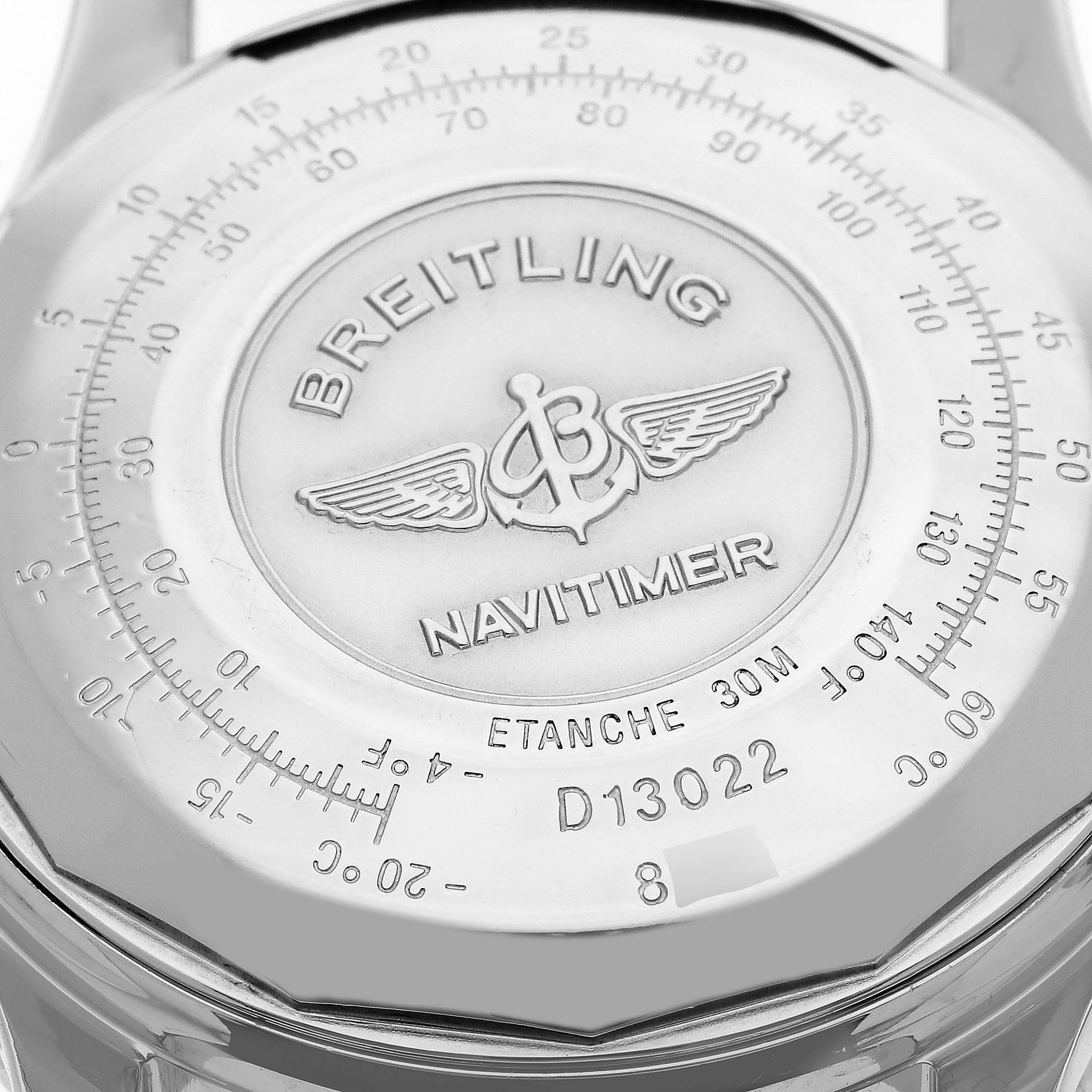 The image shows the backside of a Breitling Navitimer D13022 Men
s Stainless Steel White Dial D13022 Men
s Stainless Steel White Dial watch, highlighting the brand name, model, and various engravings.