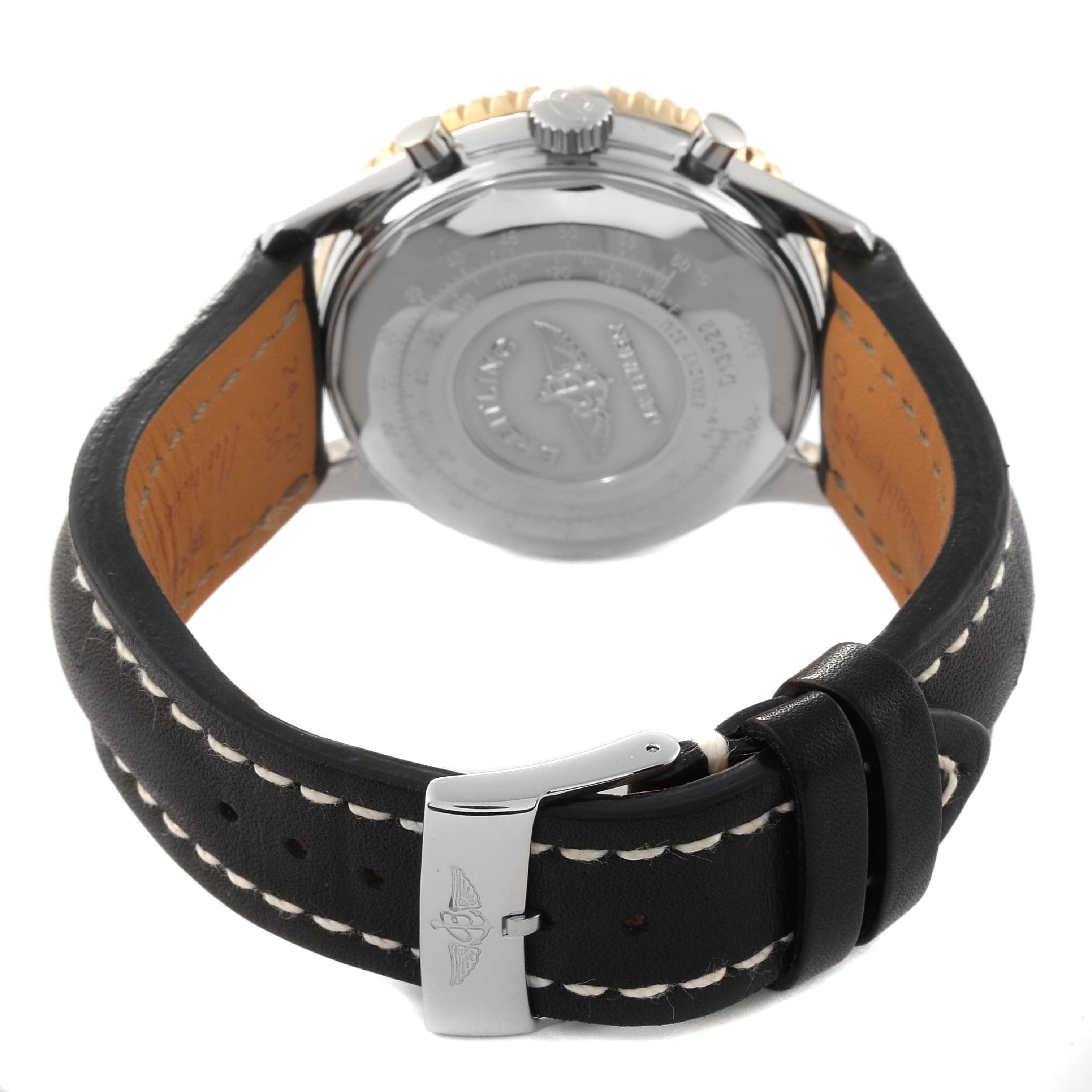 The image shows the back view of a Breitling Navitimer D13022 Men
s Stainless Steel White Dial D13022 Men
s Stainless Steel White Dial watch, highlighting the case back and black leather strap with a buckle.