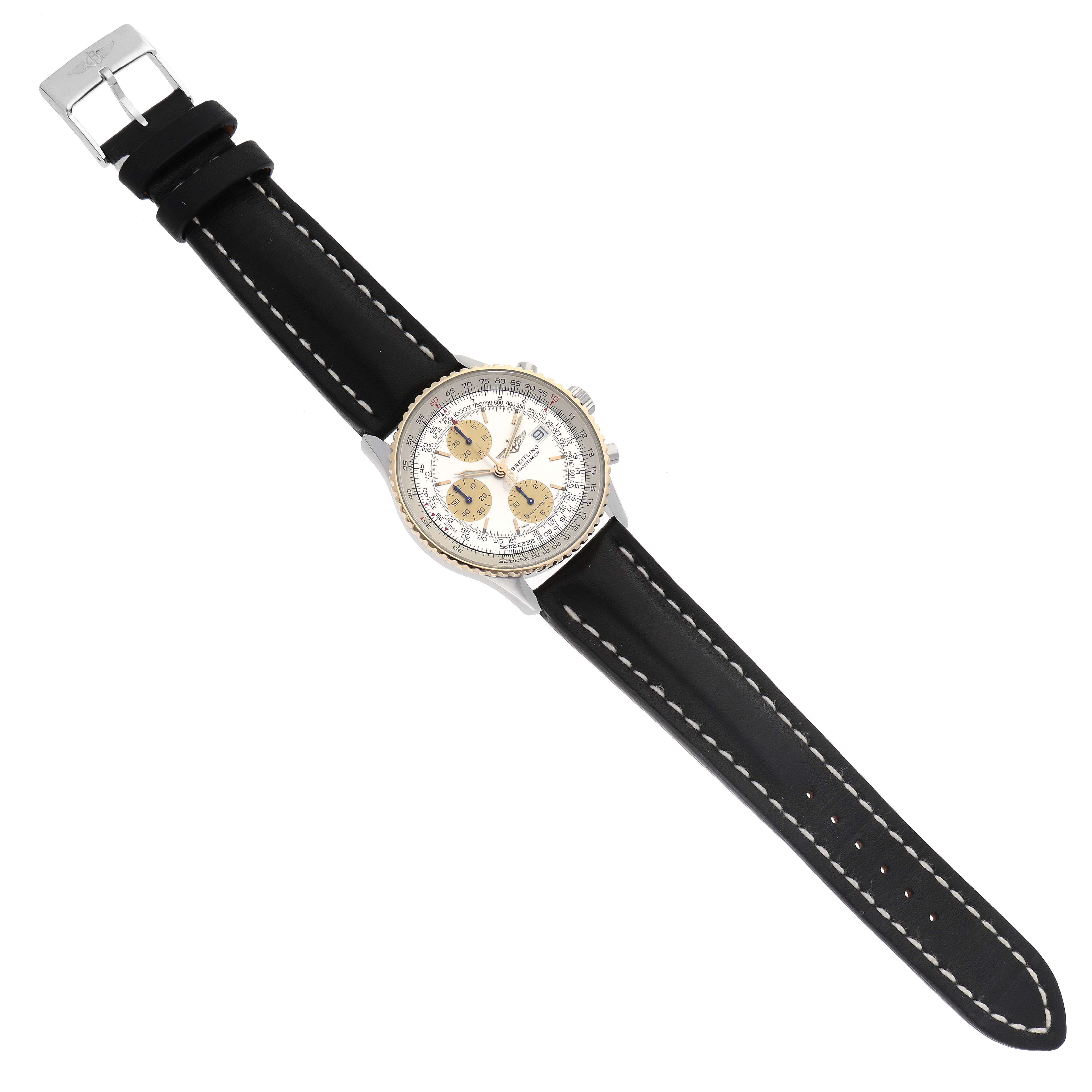 The image shows a top view of a Breitling Navitimer D13022 Men
s Stainless Steel White Dial D13022 Men
s Stainless Steel White Dial watch, highlighting the bezel, face, chronograph dials, and black leather strap.