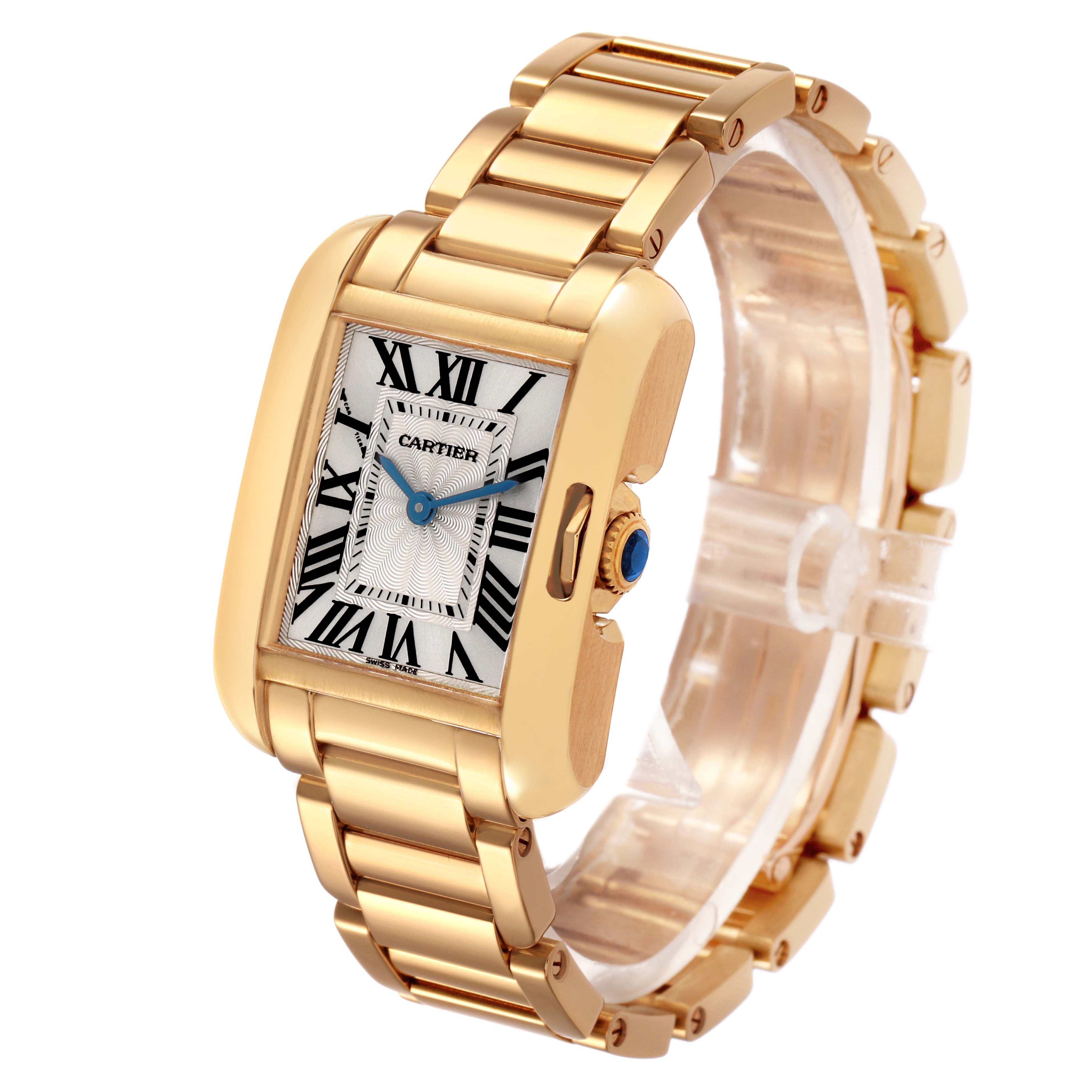 The Cartier Tank Anglaise W5310014 Women's Yellow Gold Silver Dial watch is shown at a three-quarter angle displaying its gold case, Roman numeral dial, and linked bracelet.