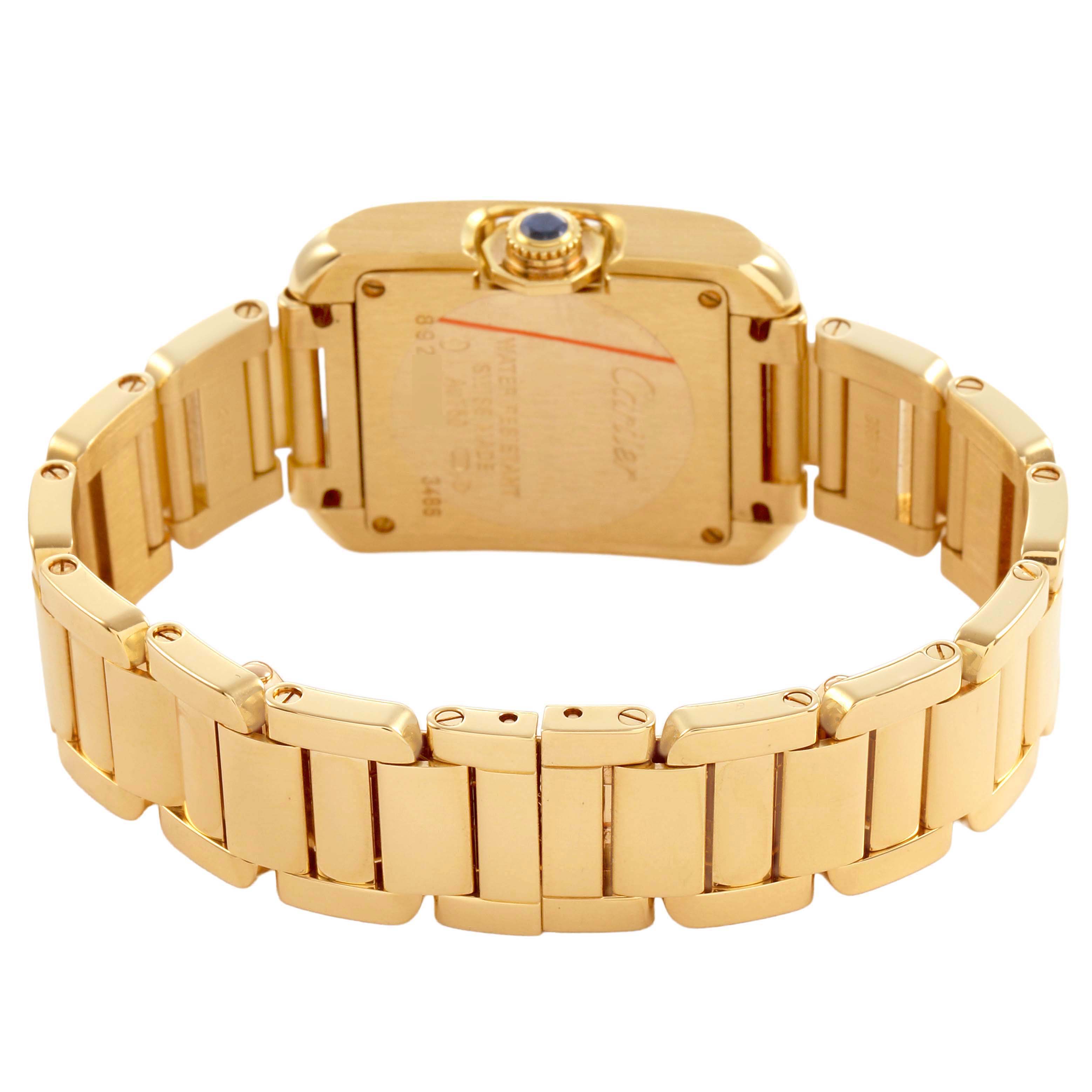 The image shows the back case and bracelet of the Cartier Tank Anglaise W5310014 Women's Yellow Gold Silver Dial watch from a rear angle.