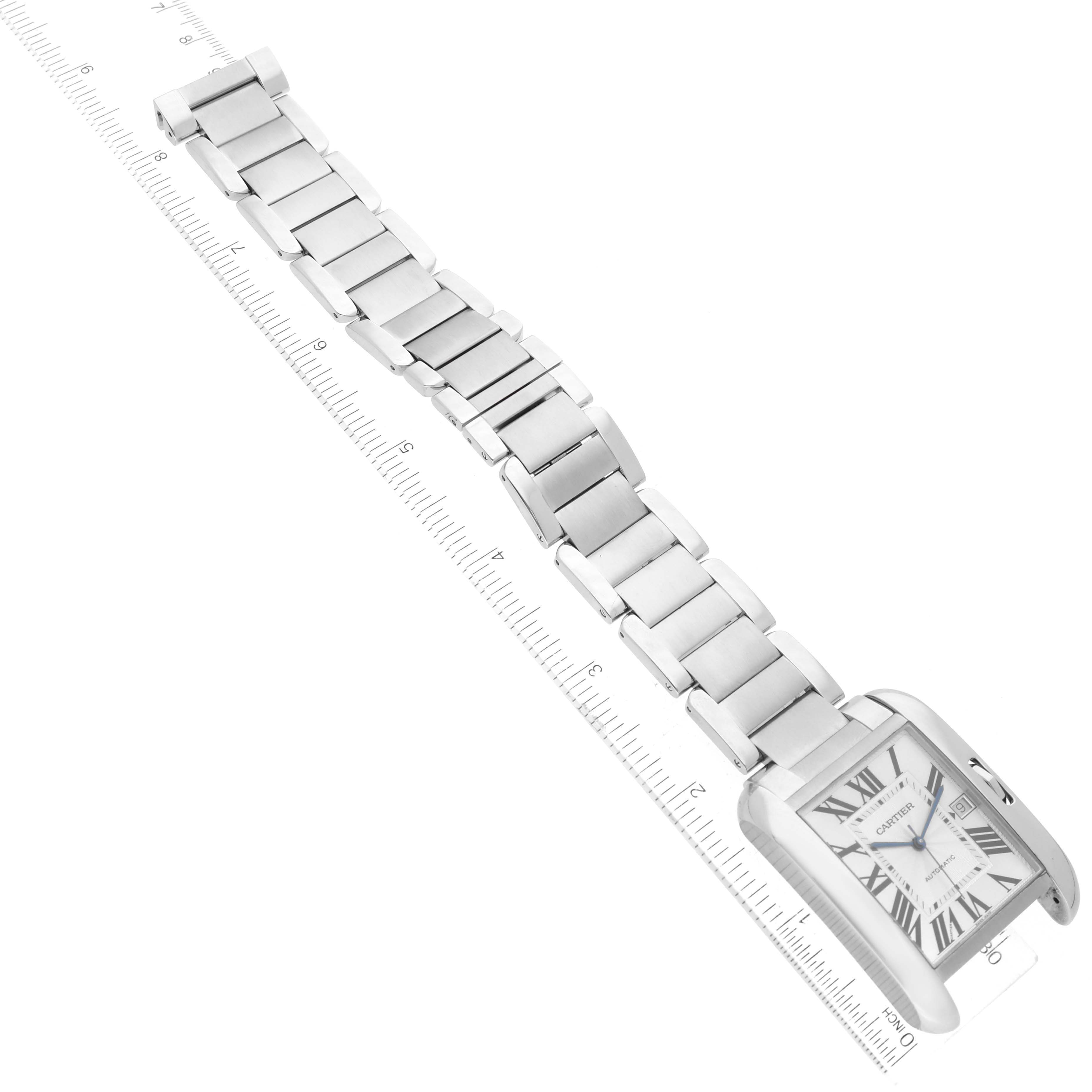 The image shows the Cartier Tank Anglaise W5310008 Men's Stainless Steel Silver Dial W5310008 Men's Stainless Steel Silver Dial watch laid flat with a ruler for scale, highlighting the bracelet and rectangular face.