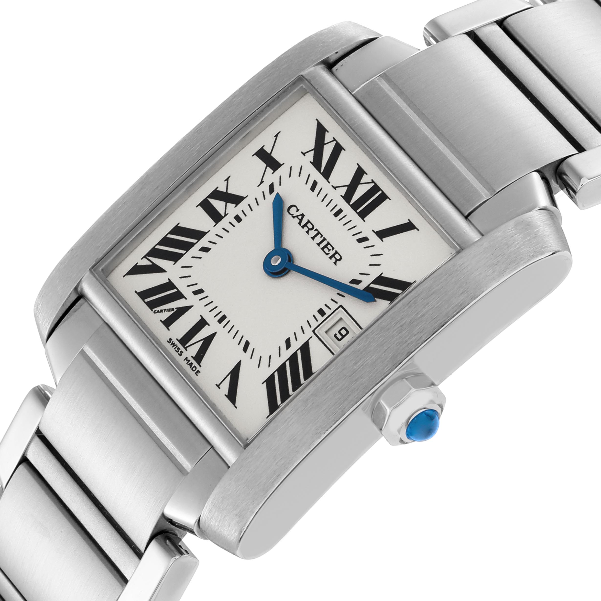 The Cartier Tank Française watch is shown at an angled close-up, highlighting the face, bezel, and part of the bracelet.