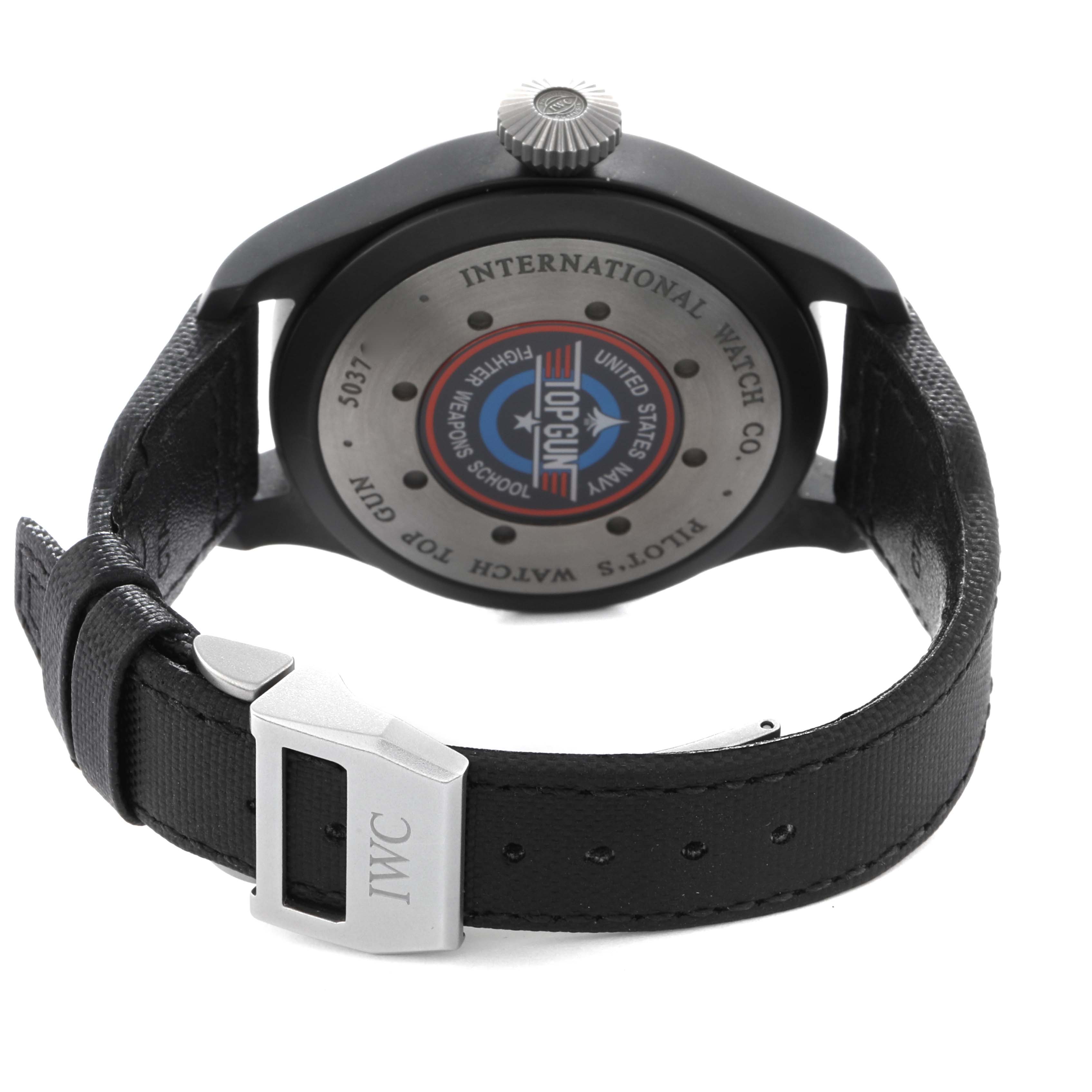 The IWC Pilot IW501901 Men
s Ceramic Black Dial IW501901 Men
s Ceramic Black Dial model is shown from the back, displaying the case back, crown, and strap with an IWC-branded clasp.