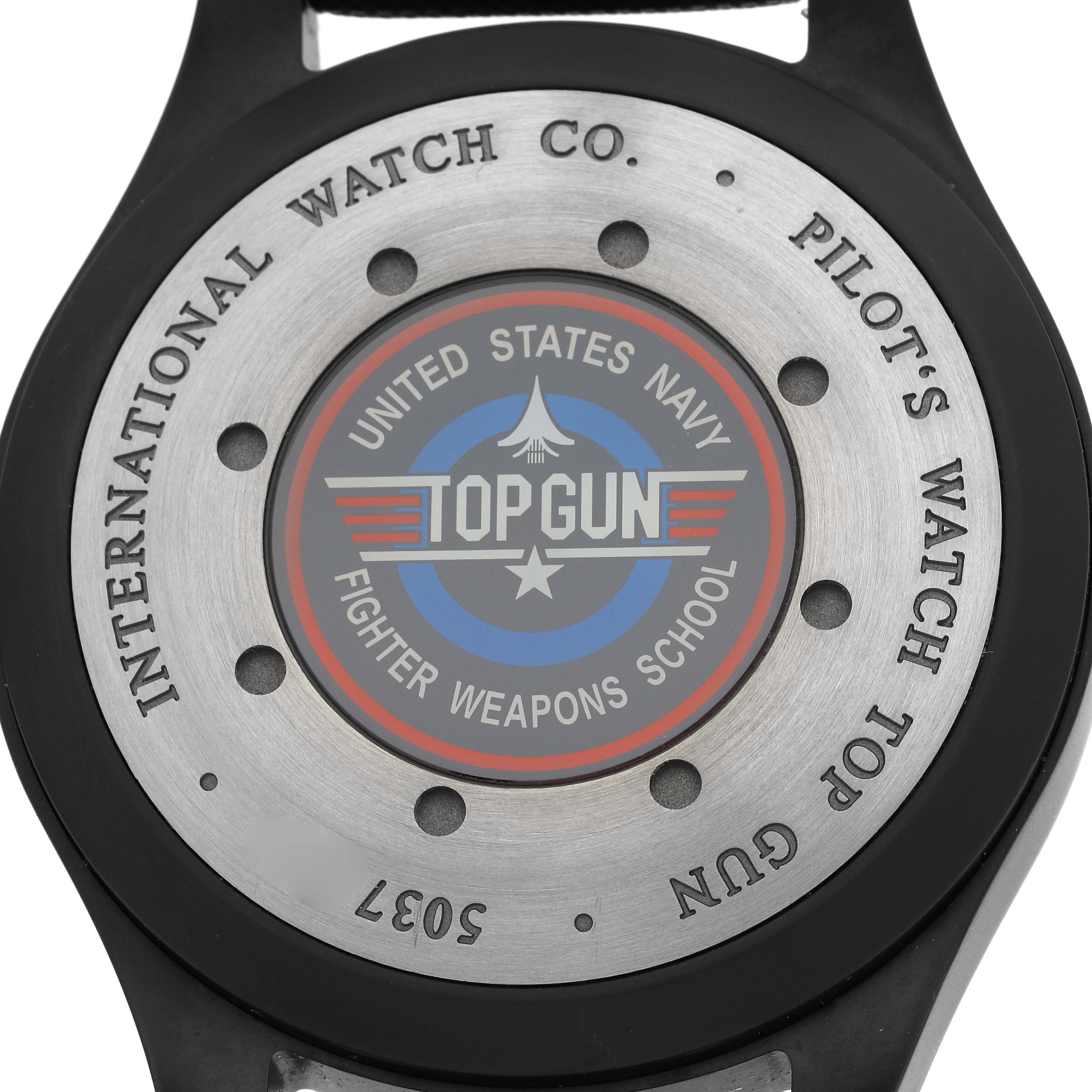 The image shows the back case of an IWC Pilot IW501901 Men
s Ceramic Black Dial IW501901 Men
s Ceramic Black Dial
s Watch, featuring "Top Gun" branding and engraved details.