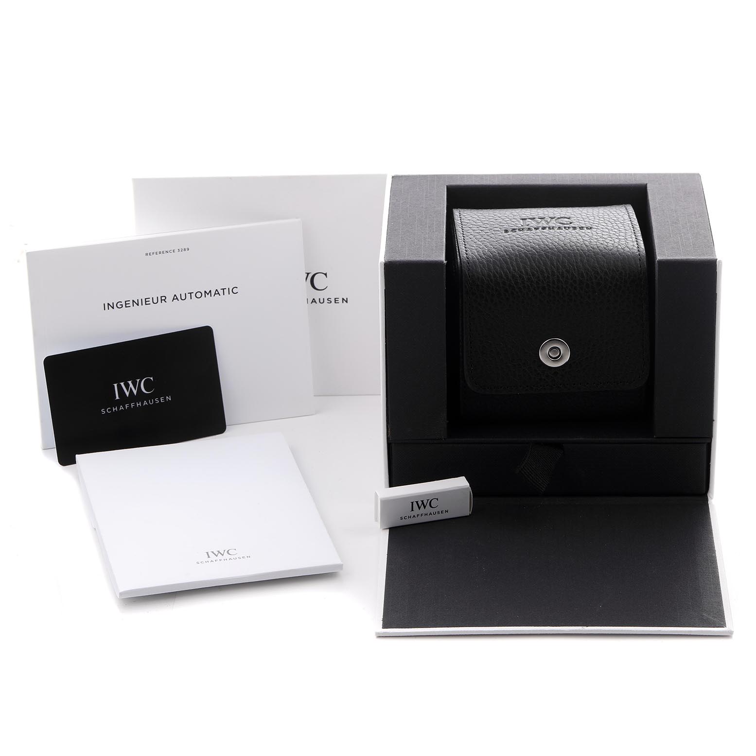 The image shows the IWC Ingenieur IW328907 Men
s Stainless Steel Blue Dial IW328907 Men
s Stainless Steel Blue Dial model watch packaging and accessories, including a box, booklet, and USB drive.