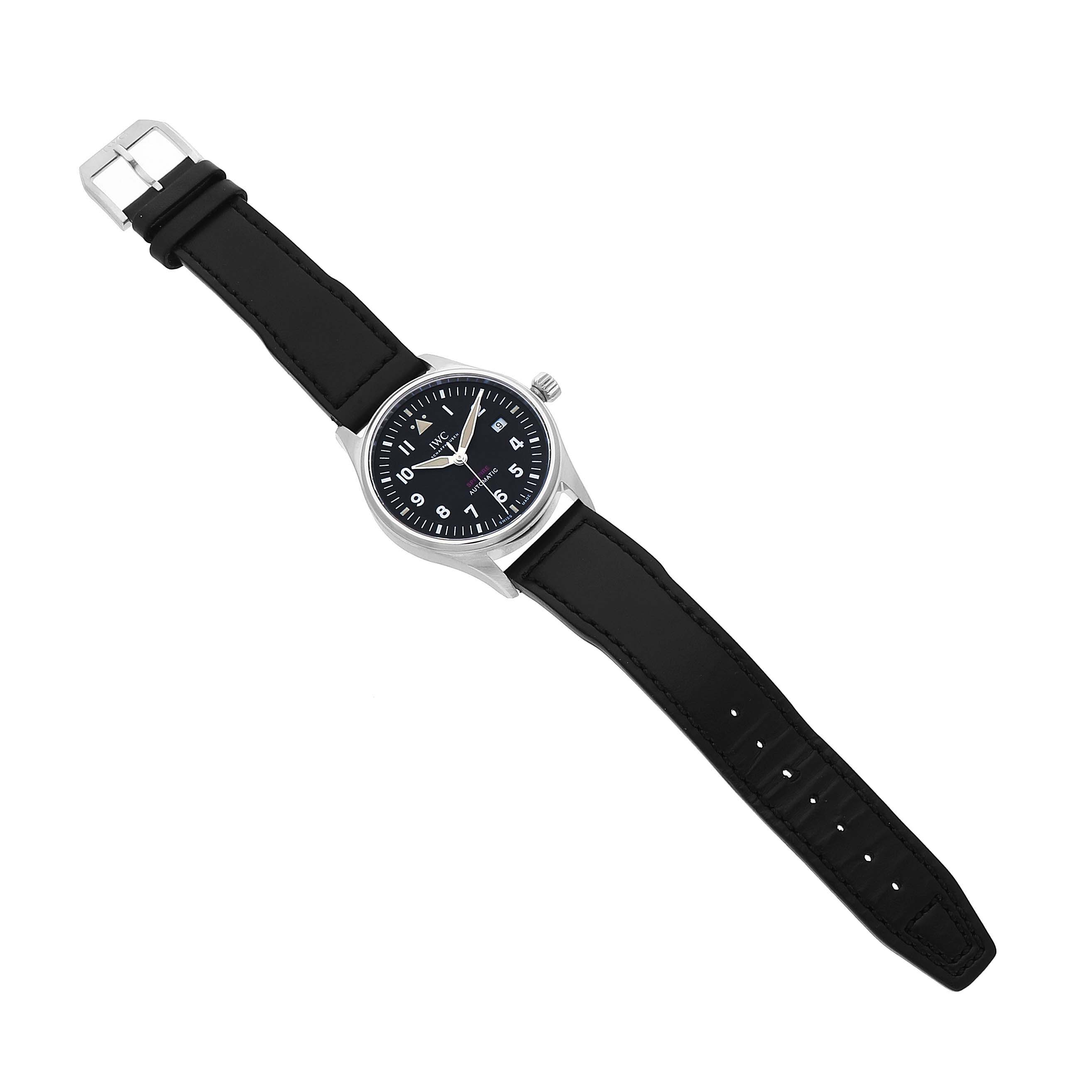 The IWC Pilot IW326801 Men's Stainless Steel Black Dial watch is shown from above, displaying the face, case, crown, and full leather strap.