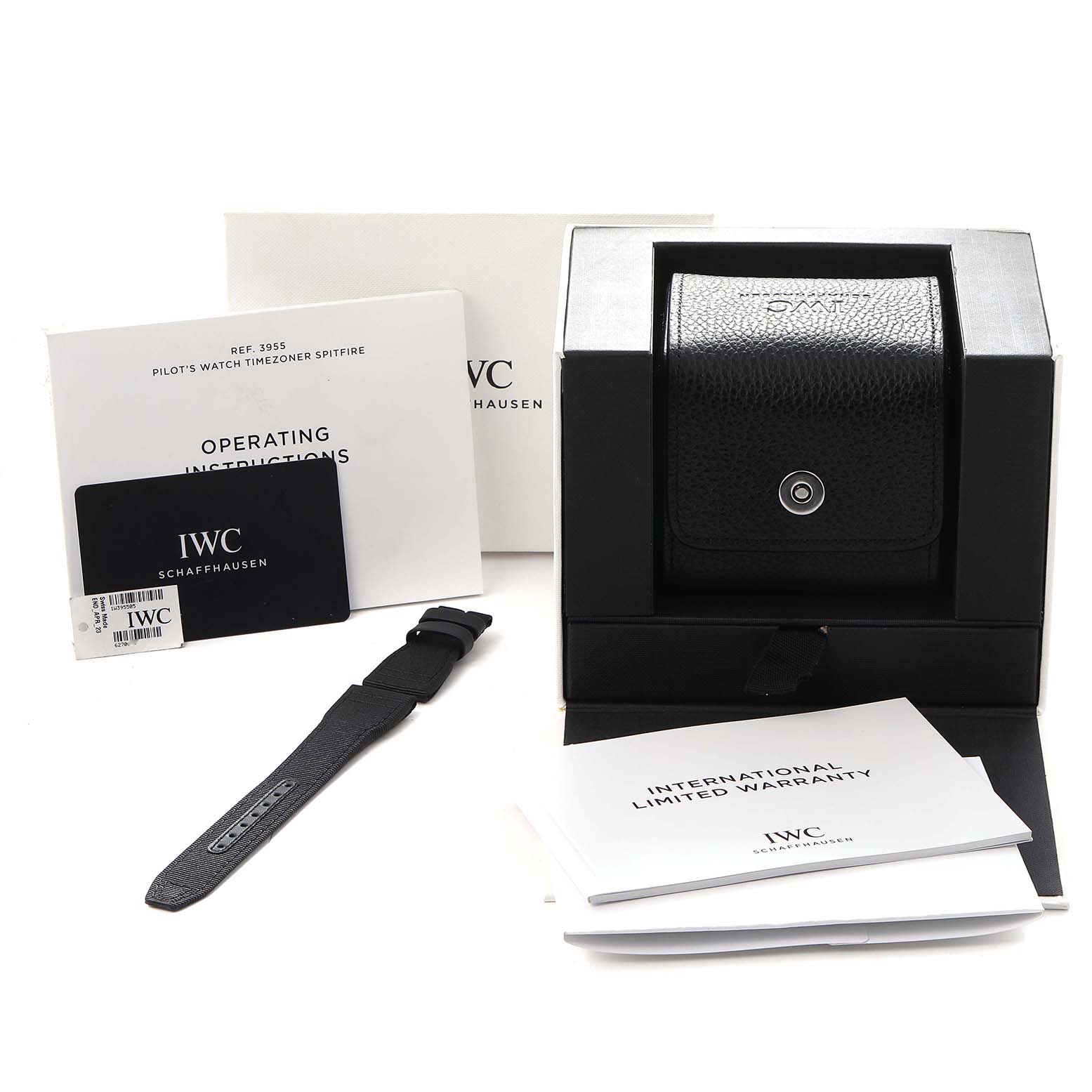 The image shows the IWC Pilot IW395505 Men
s Ceramic Black Dial IW395505 Men
s Ceramic Black Dial model packaging, with a strap, a black case, and accompanying documents.
