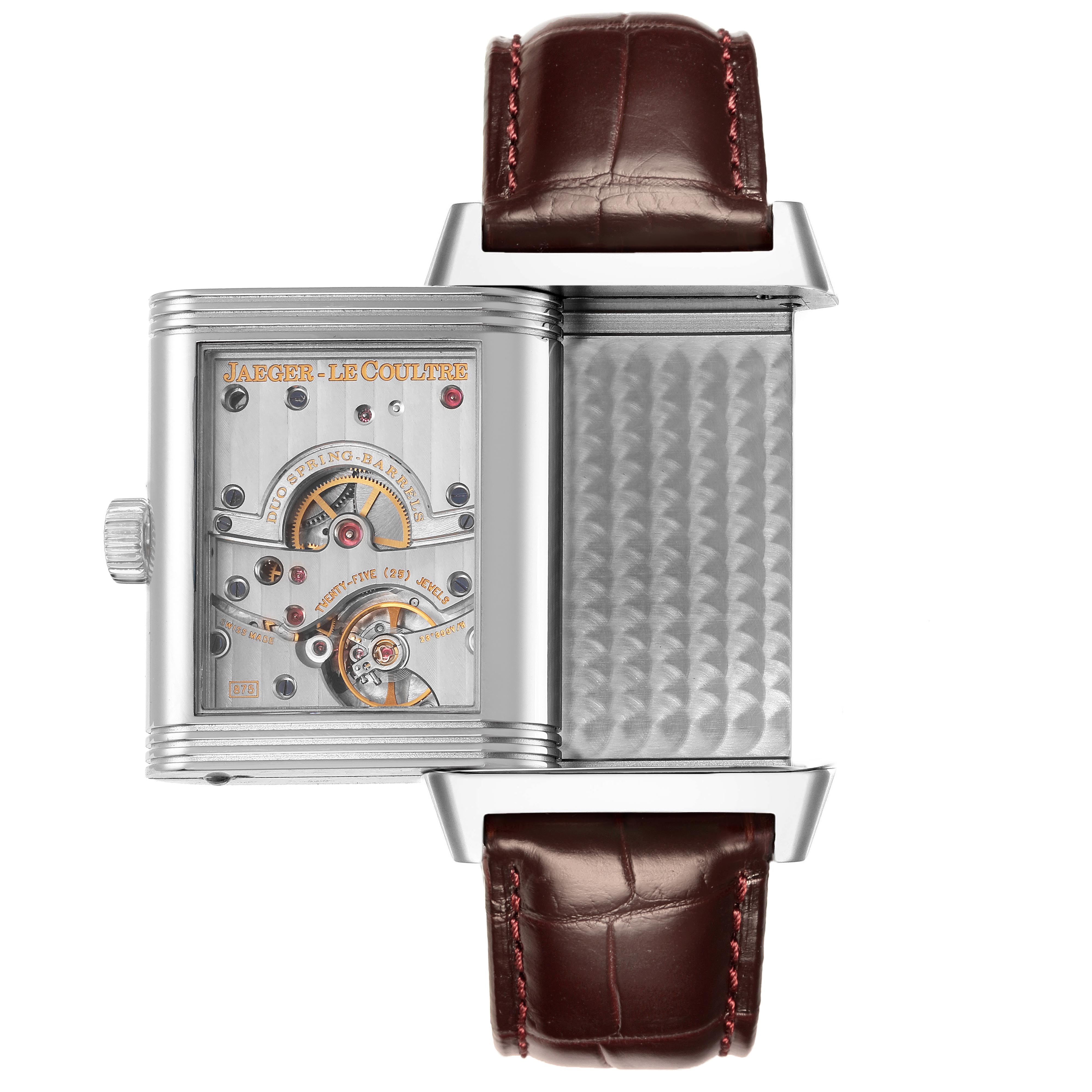 The Jaeger LeCoultre Reverso Q3008420 Men
s Stainless Steel Silver Dial Q3008420 Men
s Stainless Steel Silver Dial watch is shown half-rotated, revealing its intricate inner mechanism and one side of the case.
