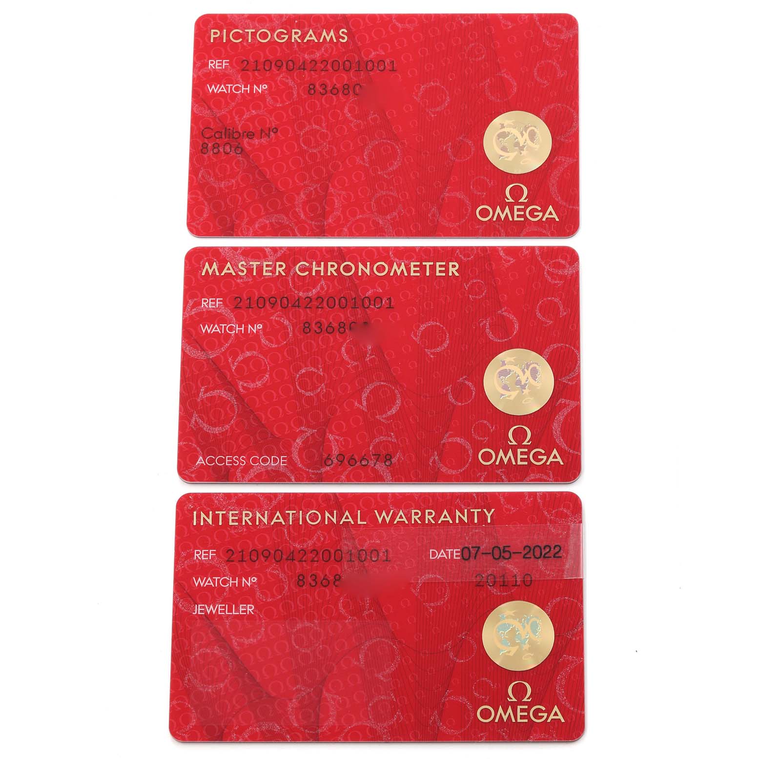 The image shows three certification cards for the Omega Seamaster 210.90.42.20.01.001 Men's Titanium Brown Dial 210.90.42.20.01.001 Men's Titanium Brown Dial model: Pictograms, Master Chronometer, and International Warranty.