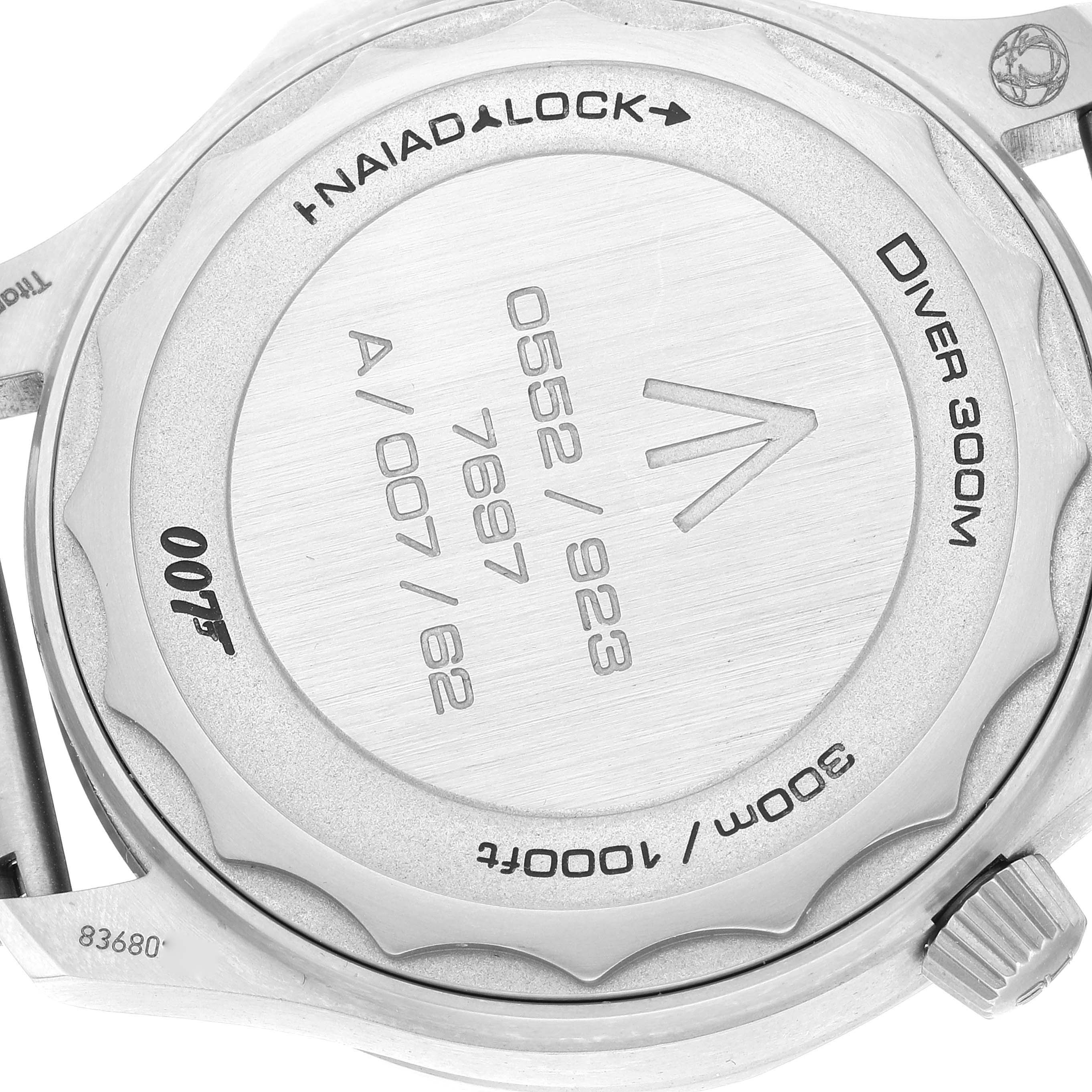 The image shows the back case of an Omega Seamaster 210.90.42.20.01.001 Men's Titanium Brown Dial 210.90.42.20.01.001 Men's Titanium Brown Dial Diver 300M watch, highlighting engravings and the Naiad Lock system.