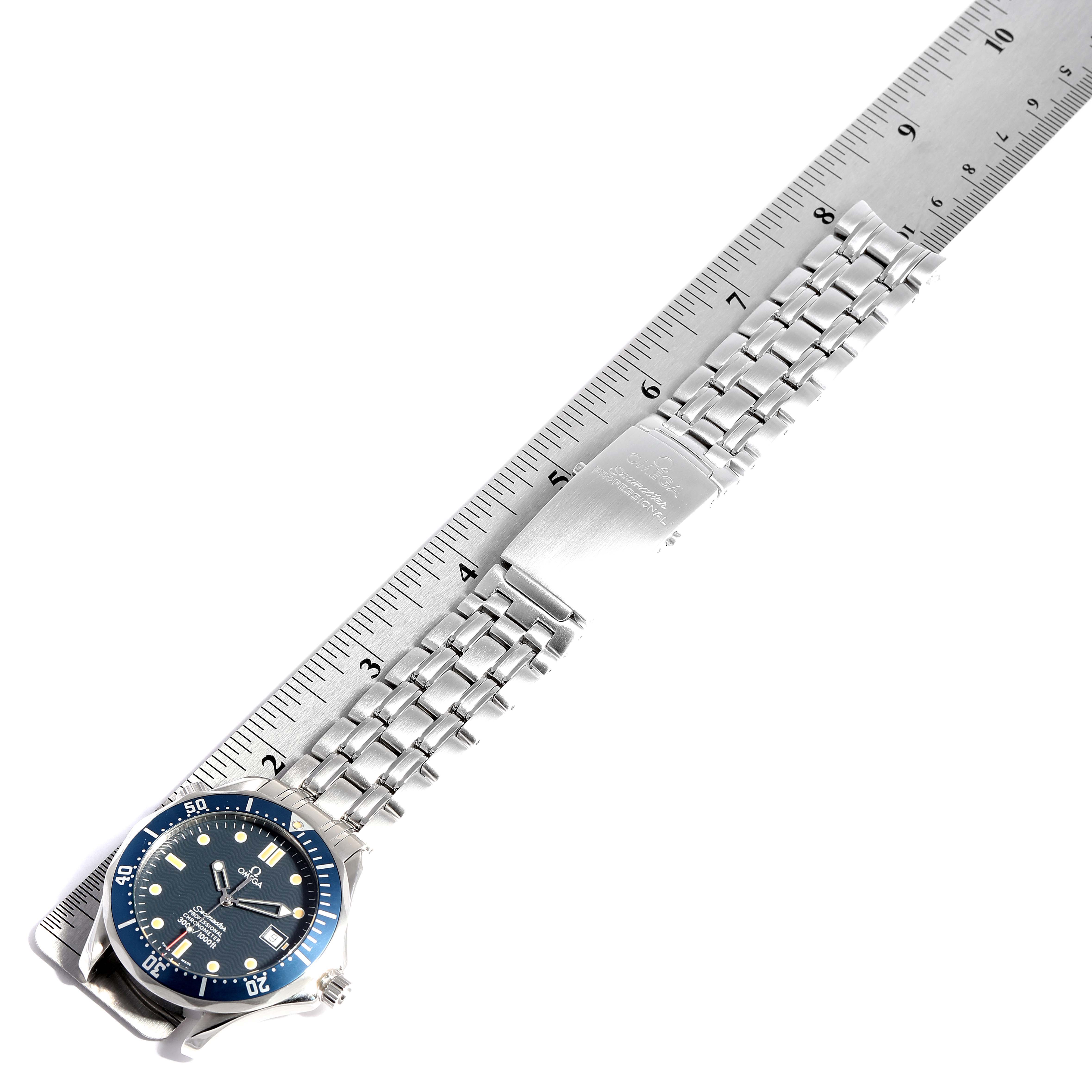 The image shows an Omega Seamaster 2531.80.00 Men
s Stainless Steel Blue Dial 2531.80.00 Men
s Stainless Steel Blue Dial watch laid flat with a stainless steel bracelet, measured with a ruler for length.