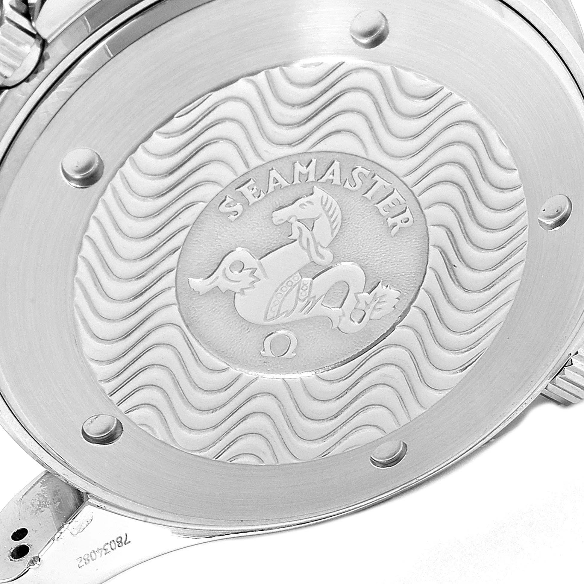 The image shows the back case of an Omega Seamaster 2594.50.00 Men
s Stainless Steel Black Dial 2594.50.00 Men
s Stainless Steel Black Dial watch with its wavy design and logo engravings.