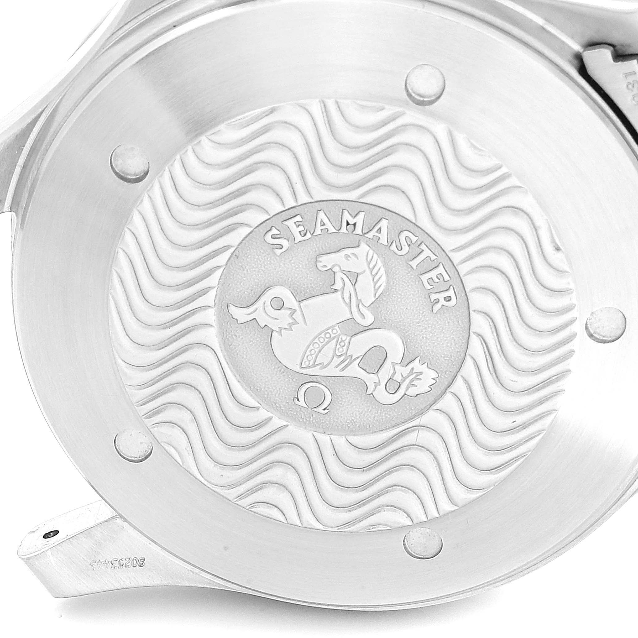 This image shows the engraved case back of an Omega Seamaster 2538.20.00 Men's Stainless Steel White Dial 2538.20.00 Men's Stainless Steel White Dial watch from a close-up angle.