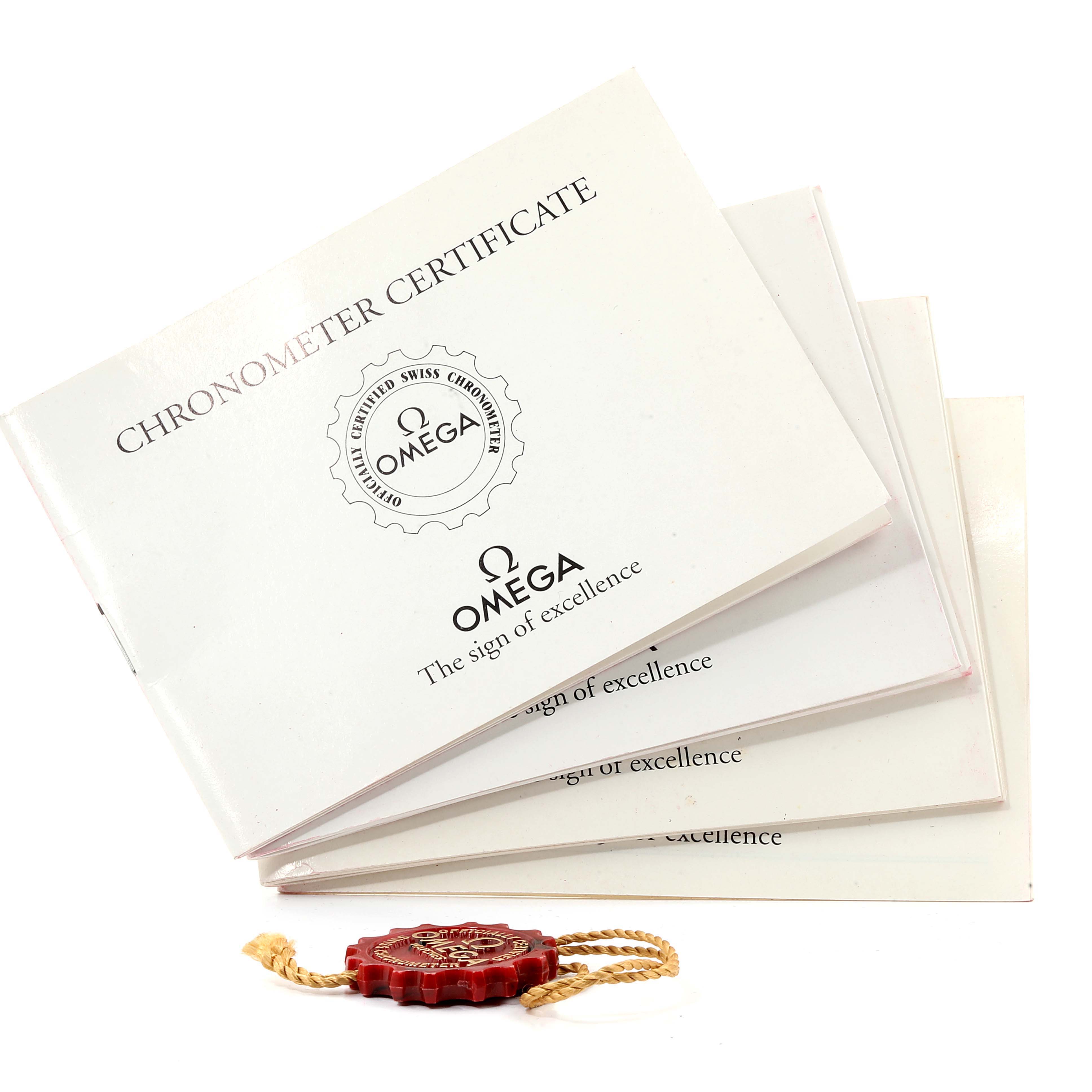 The image shows Omega Seamaster 2599.80.00 Men
s Stainless Steel Blue Dial 2599.80.00 Men
s Stainless Steel Blue Dial model documentation including the chronometer certificate booklet and a red Omega tag.