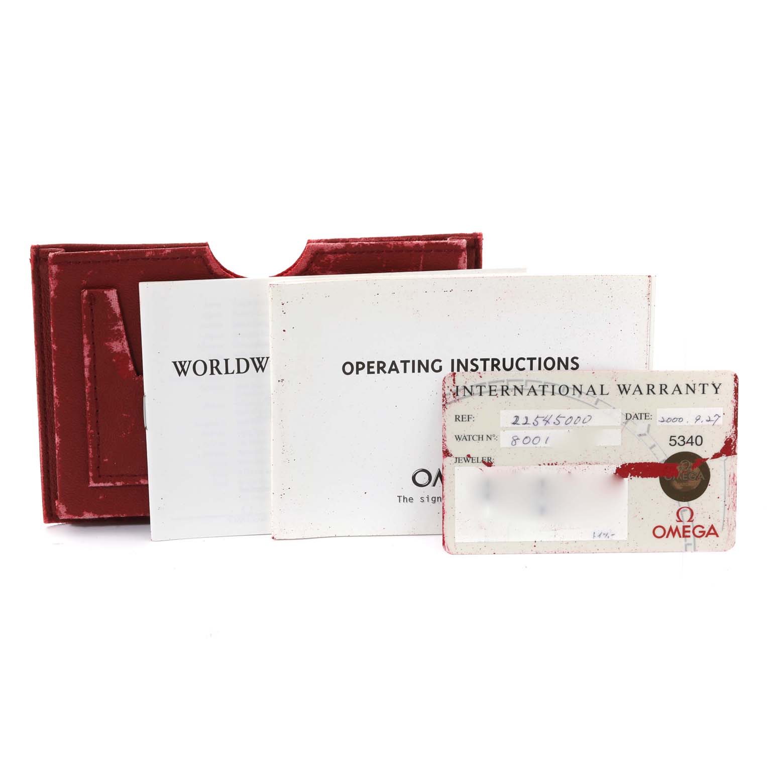 The image shows the warranty card, operating instructions, and a red case for the Omega Seamaster 2254.50.00 Men
s Stainless Steel Black Dial 2254.50.00 Men
s Stainless Steel Black Dial watch.