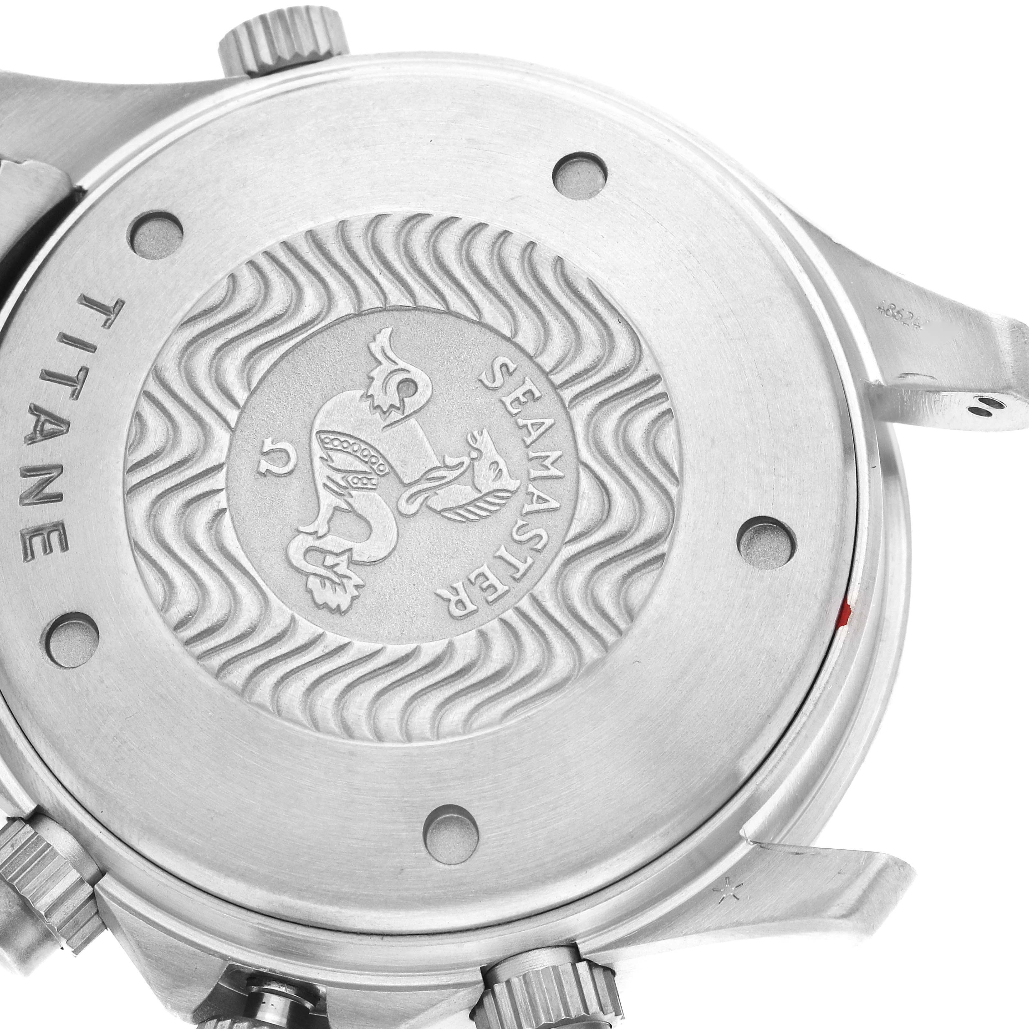 This image shows the back case of an Omega Seamaster 2298.80.00 Men's Stainless Steel Blue Dial 2298.80.00 Men's Stainless Steel Blue Dial watch, highlighting its engravings and buttons.