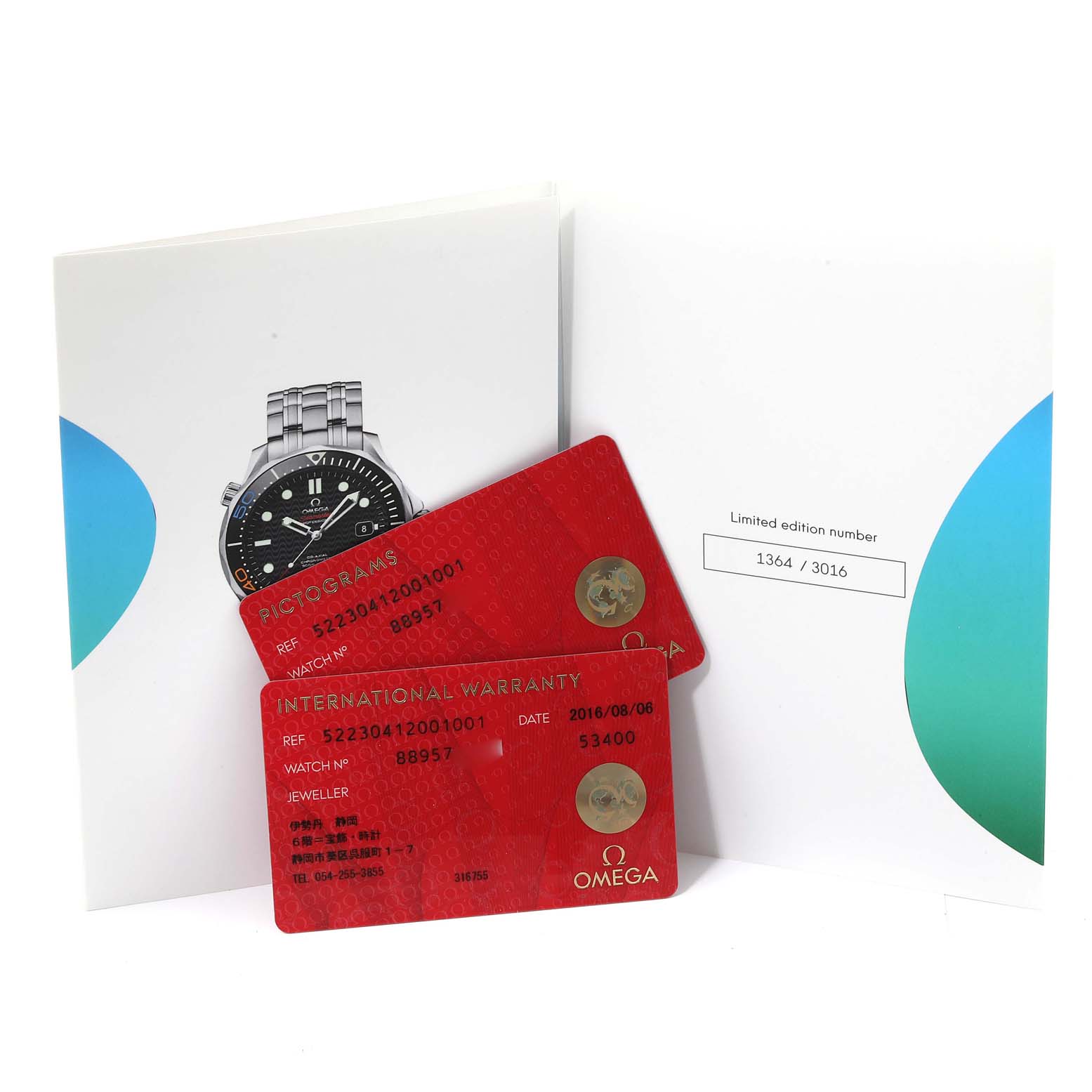 The image shows the International Warranty and Pictogram cards, a booklet featuring the Omega Seamaster 522.30.41.20.01.001 Men's Stainless Steel Black Dial 522.30.41.20.01.001 Men's Stainless Steel Black Dial watch, and a limited edition certificate.