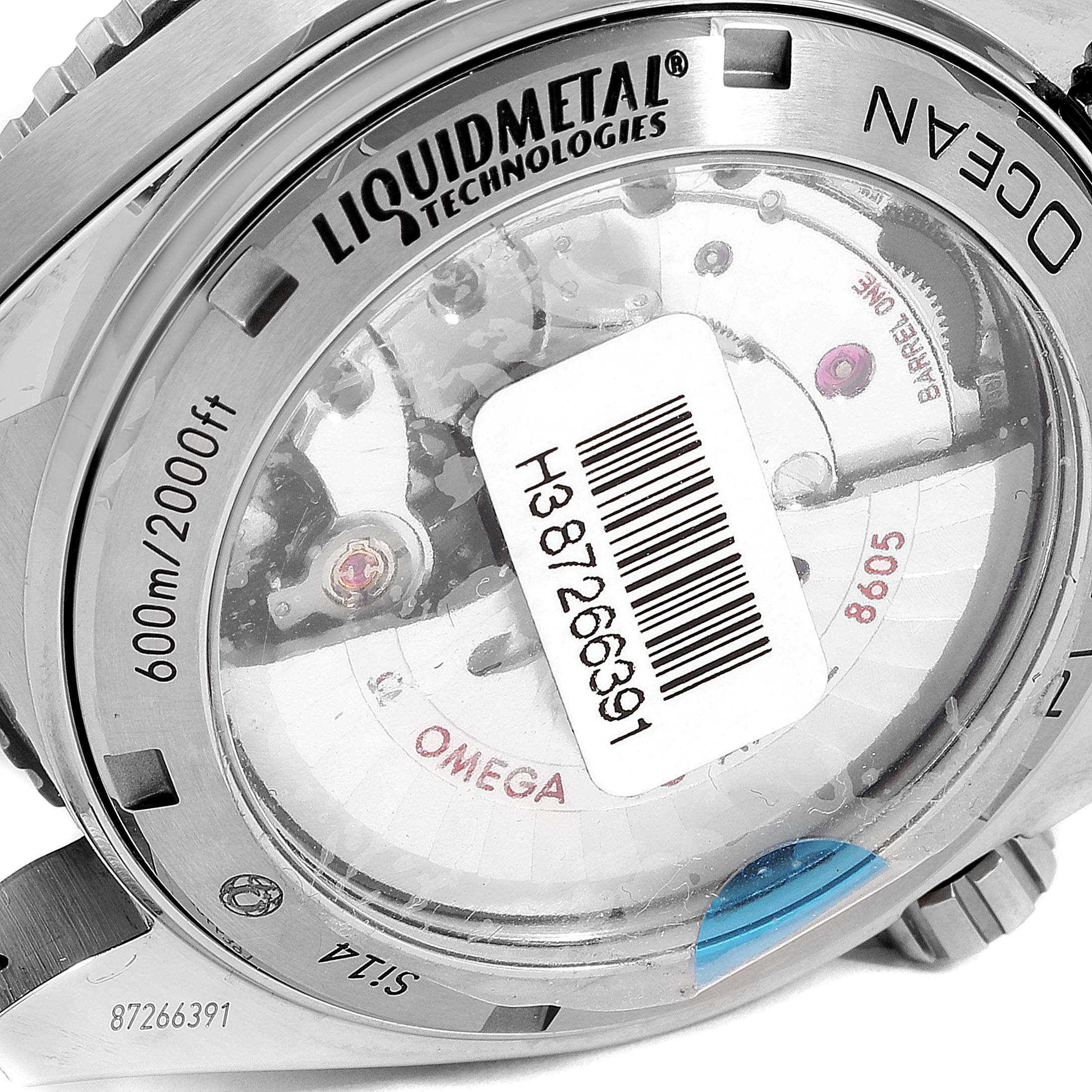 This is a rear view of the Omega Planet Ocean 232.90.44.22.03.001 Men's Titanium Blue Dial 232.90.44.22.03.001 Men's Titanium Blue Dial watch showing the transparent case back and internal mechanisms.