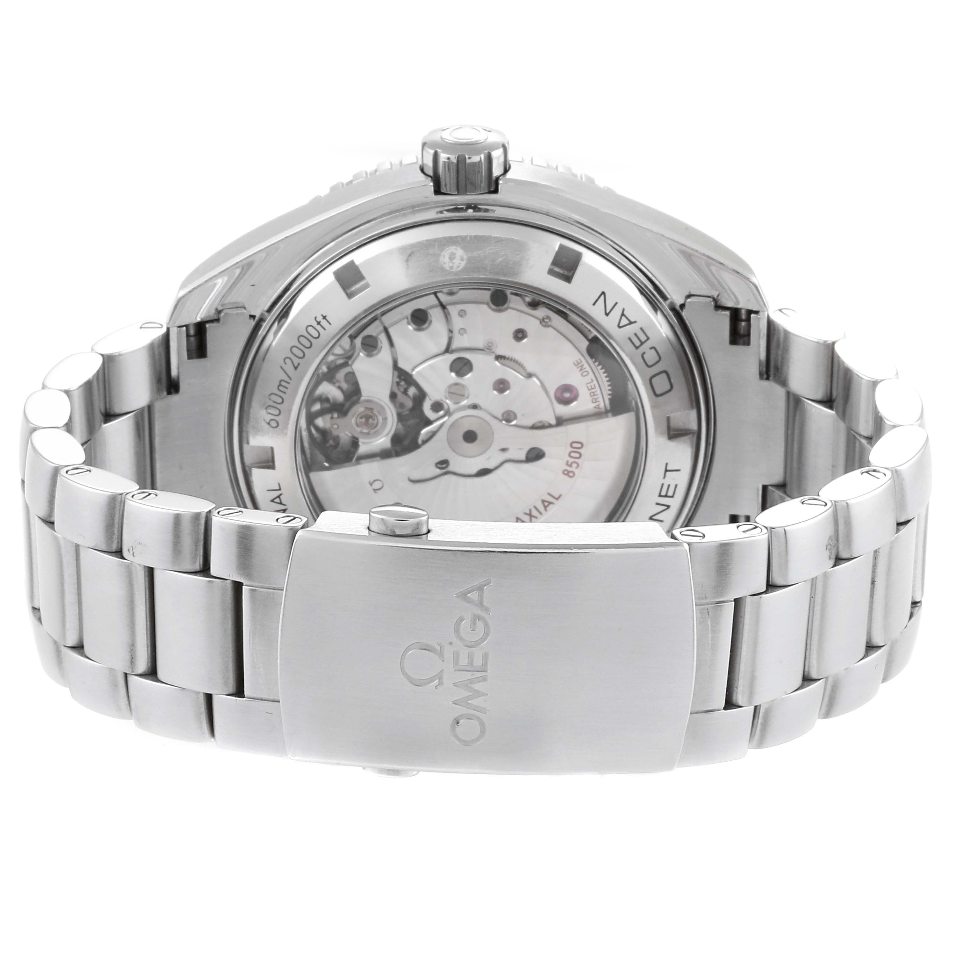 This image shows the back and clasp of an Omega Planet Ocean 232.30.46.21.01.001 Men
s Stainless Steel Black Dial 232.30.46.21.01.001 Men
s Stainless Steel Black Dial watch, showcasing its mechanism and stainless steel bracelet.