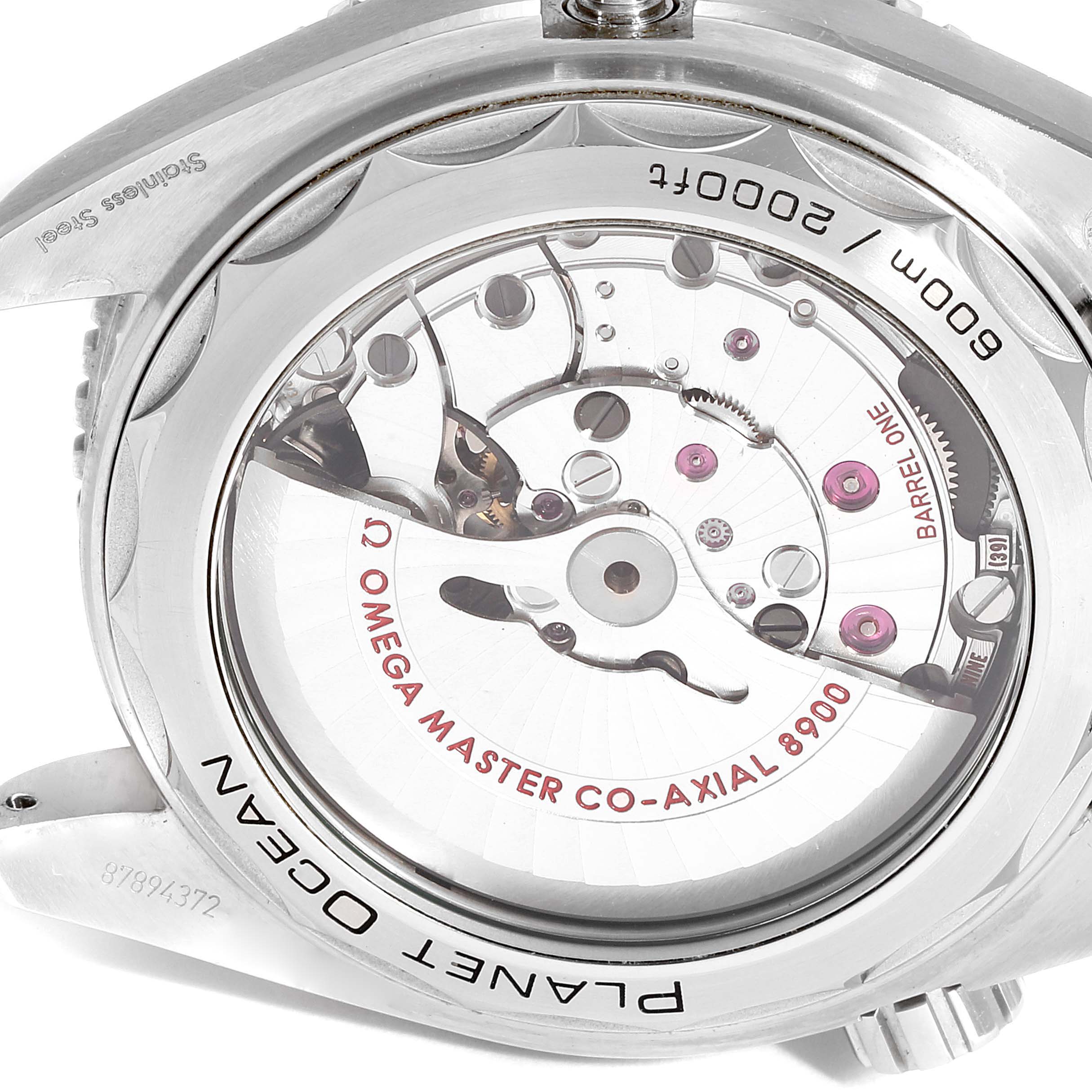 The image shows the back view of the Omega Planet Ocean 215.30.44.21.03.001  Men
s Stainless Steel Blue Dial 215.30.44.21.03.001  Men
s Stainless Steel Blue Dial watch, highlighting its exposed mechanical movement.