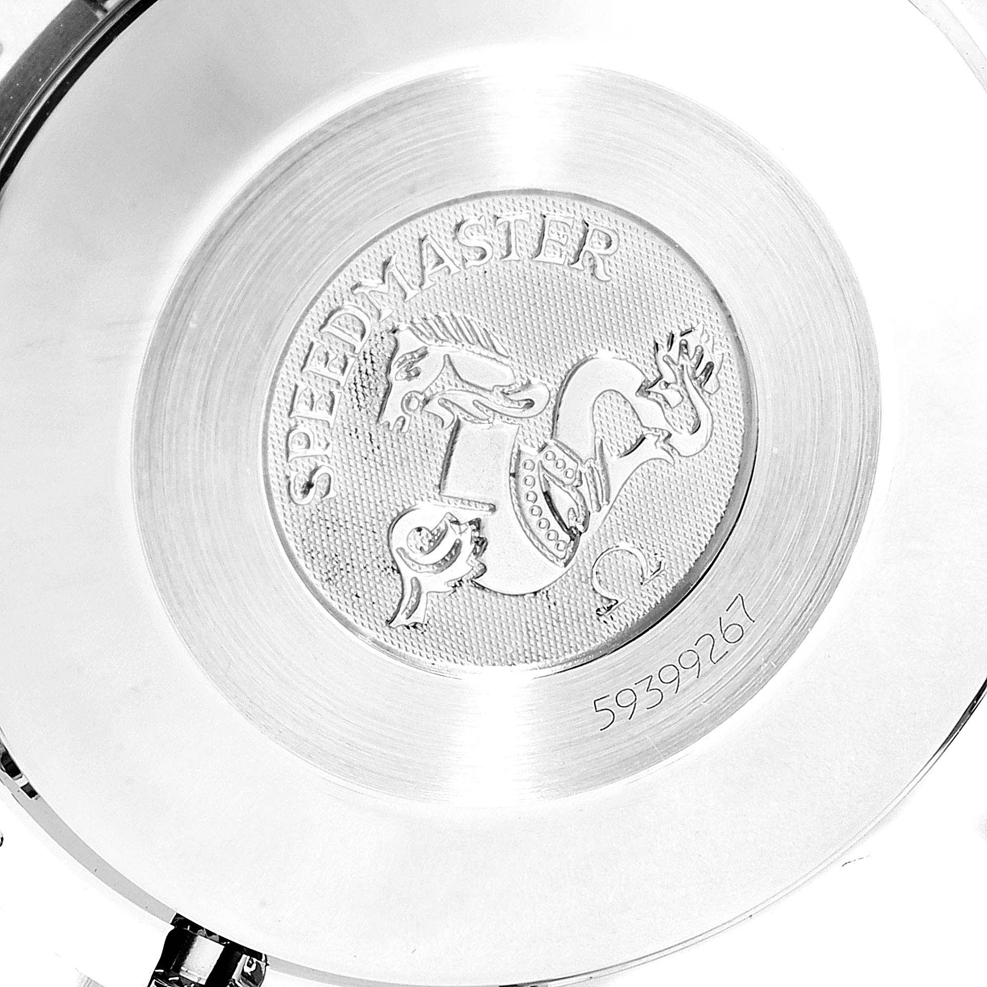 This image shows the engraved case back of an Omega Speedmaster  Men's Stainless Steel Black Dial  Men's Stainless Steel Black Dial watch, featuring the serial number and brand emblem.